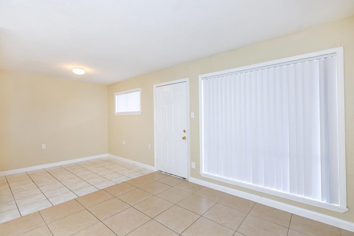 Dining room and living room with tile floors