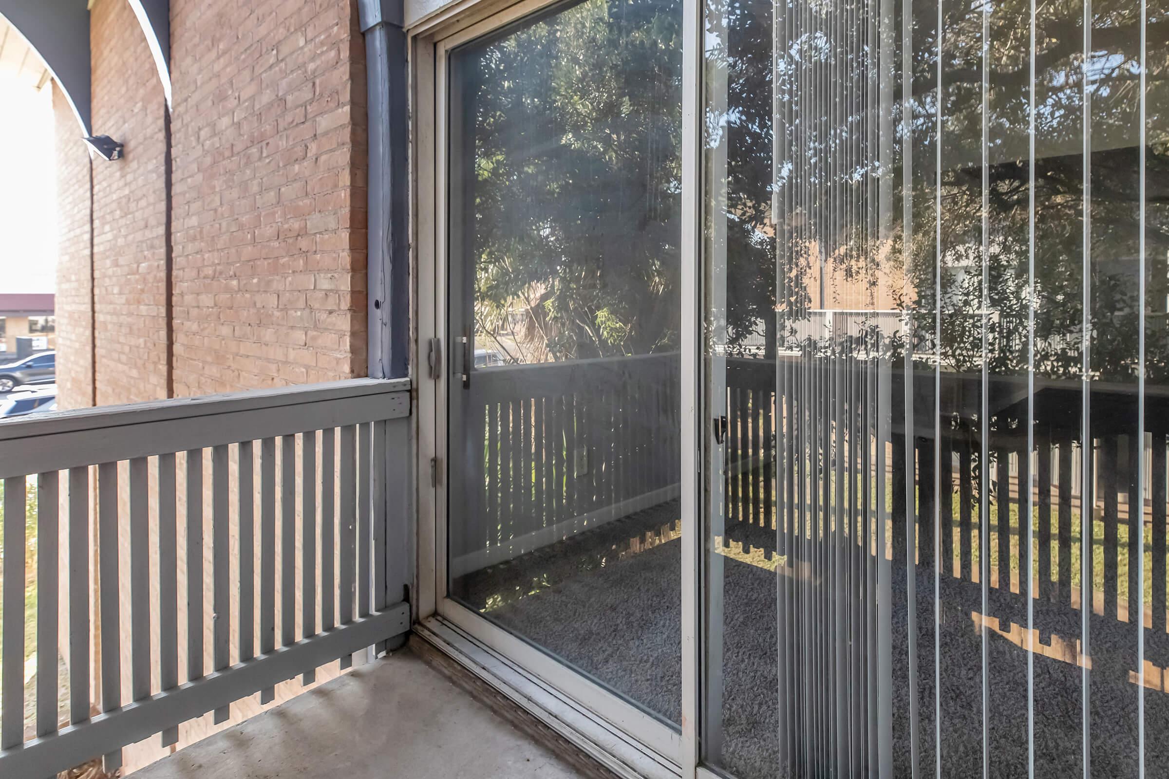 a building with a metal fence