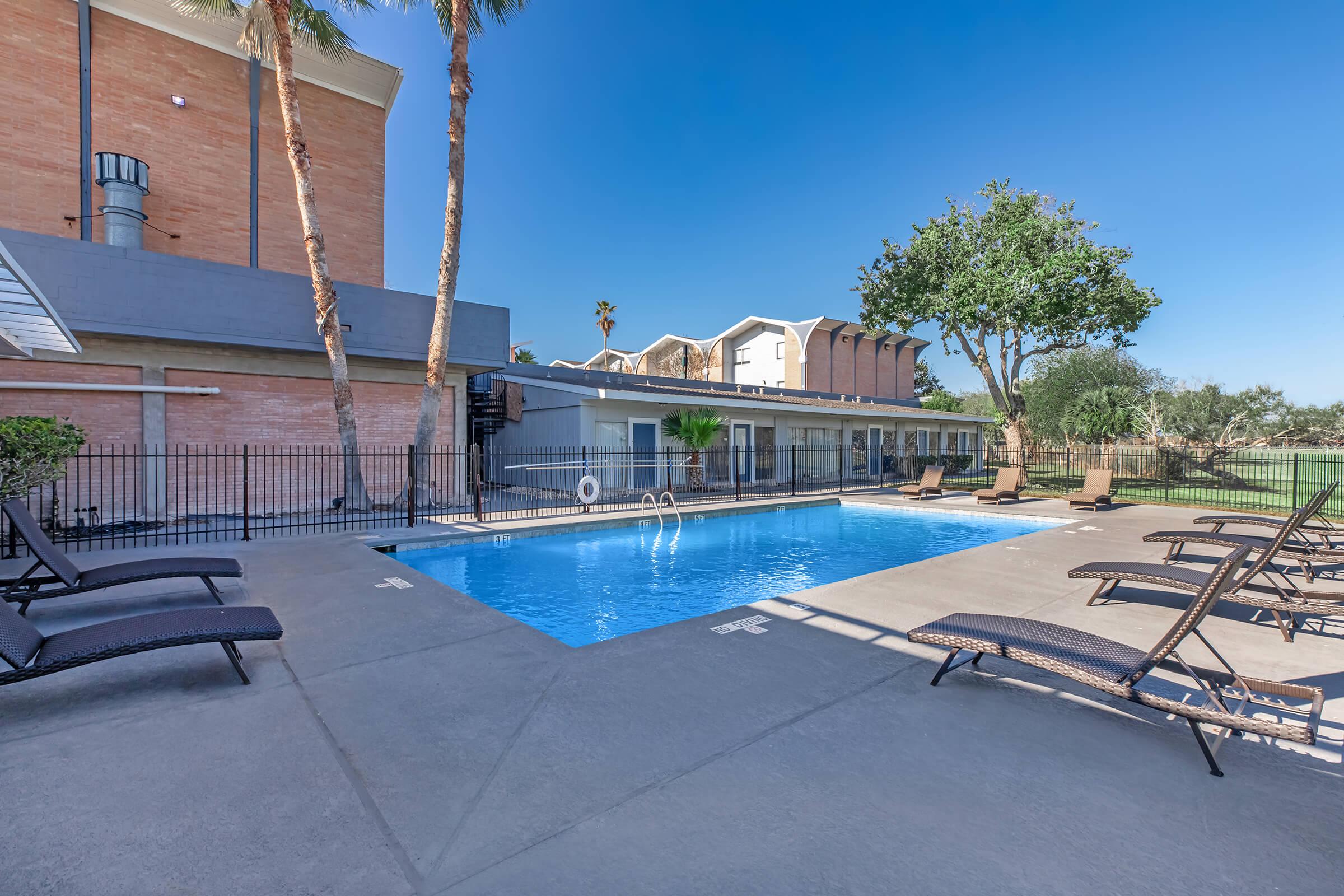 a pool next to a building