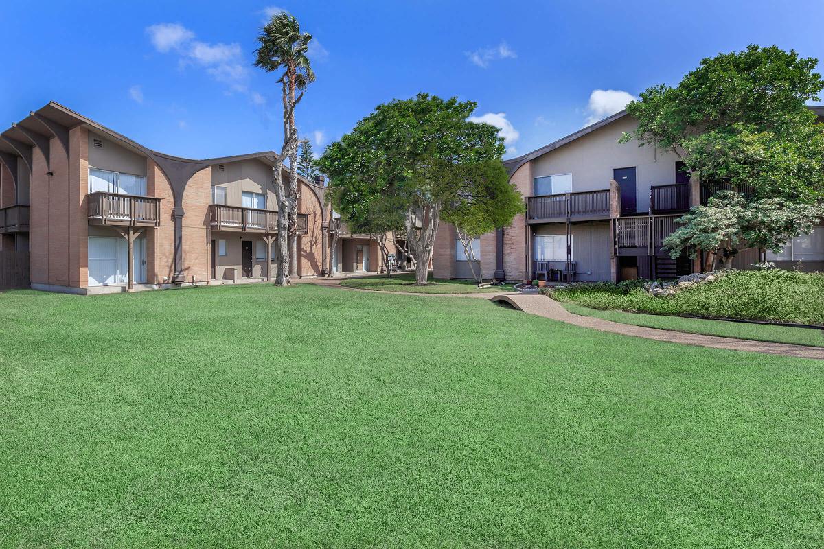 a large lawn in front of a house