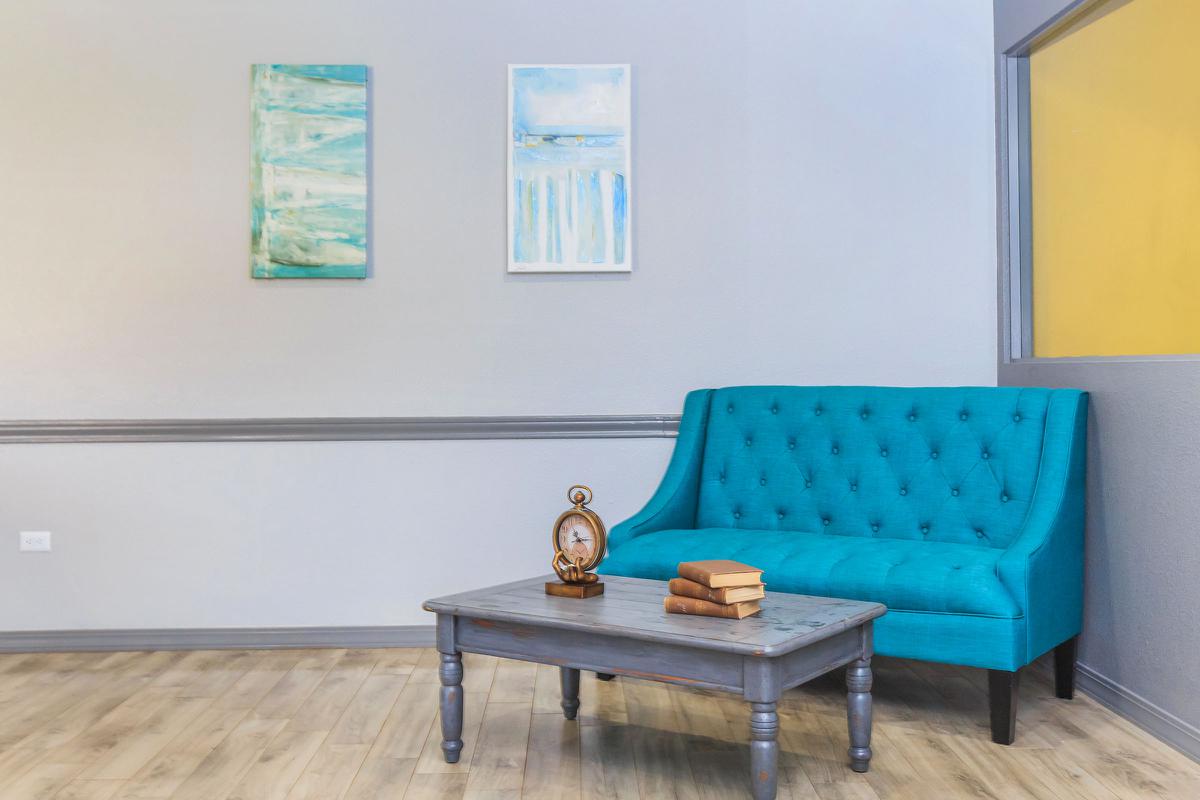 a living room with a wooden table