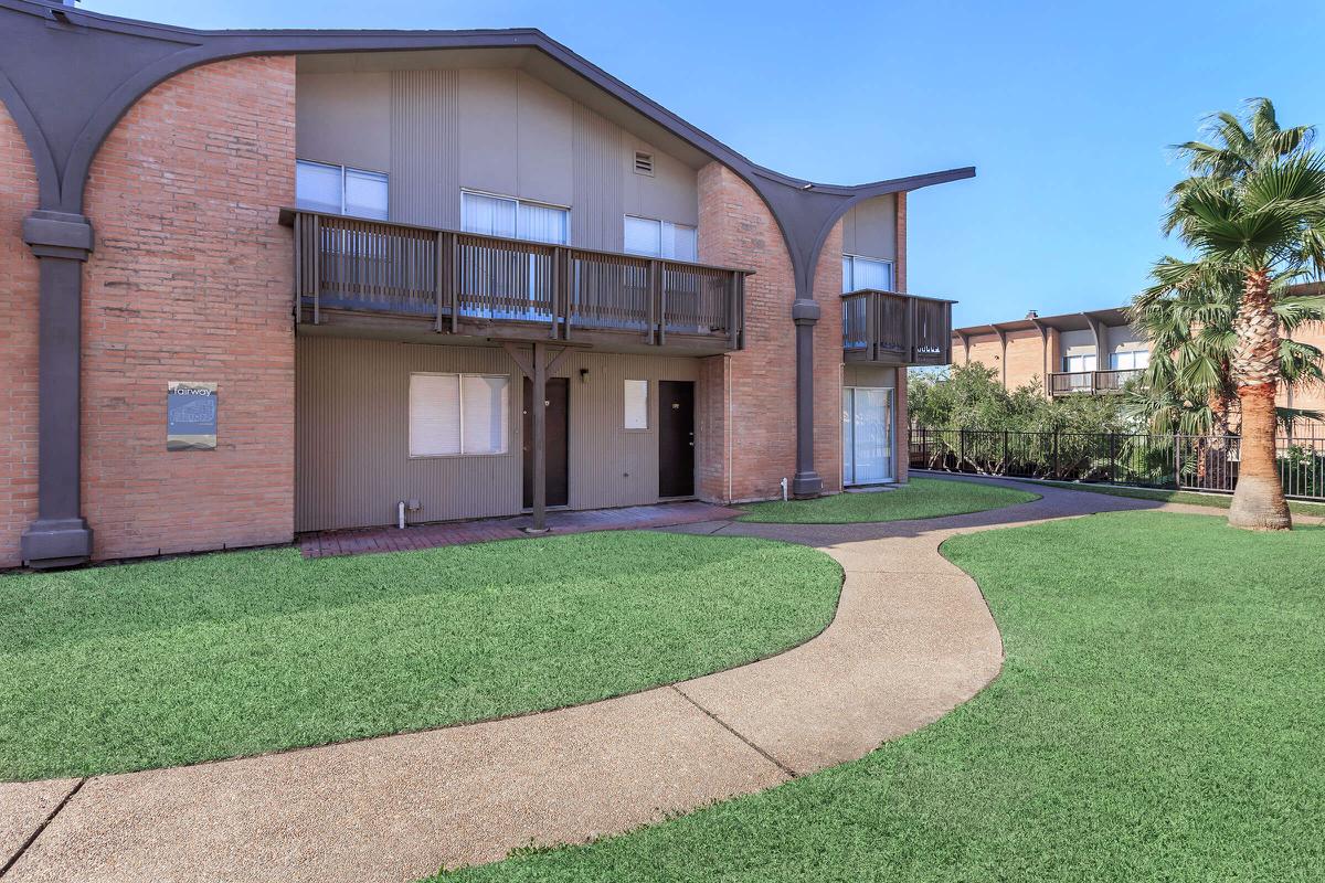 a large lawn in front of a house