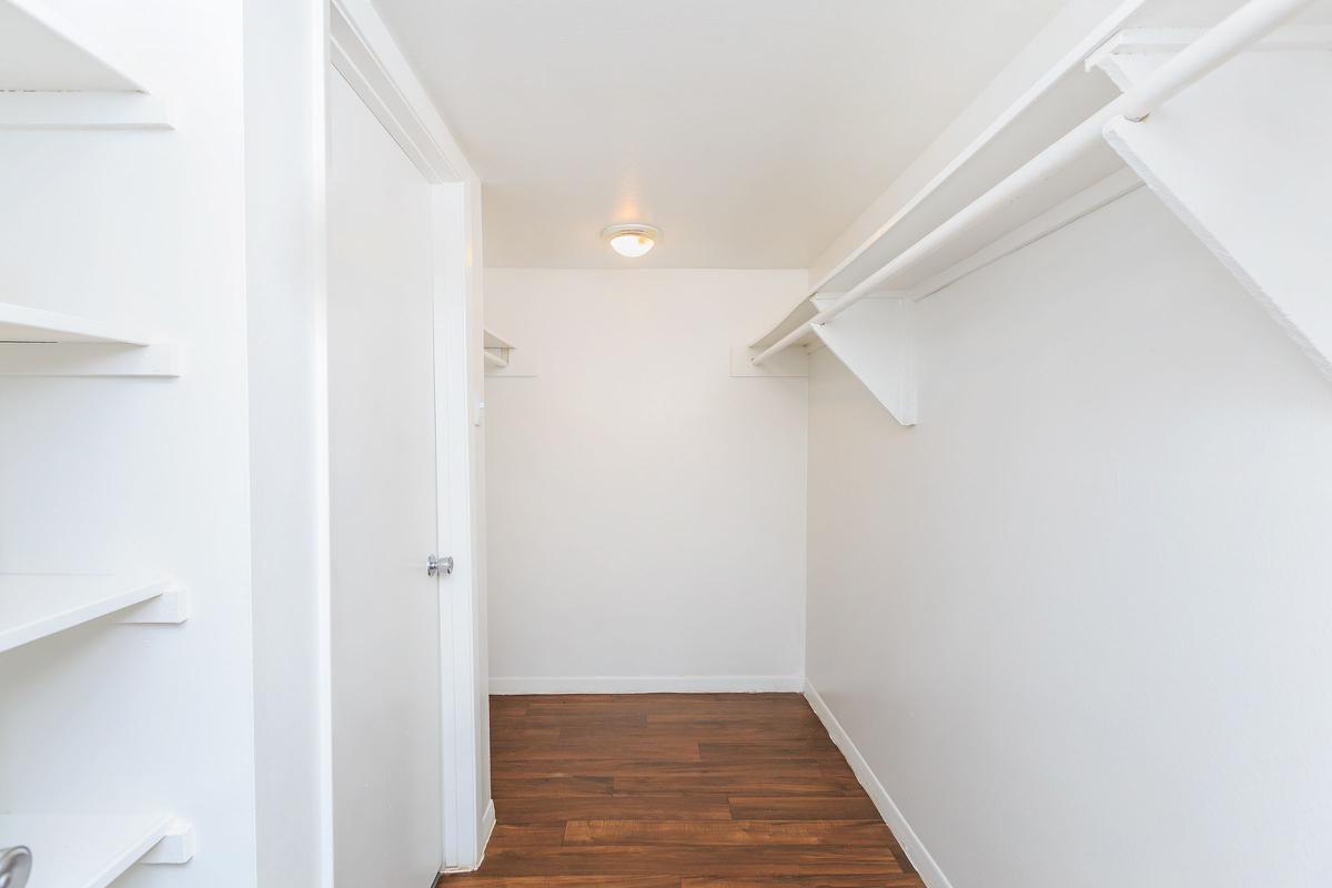 a white refrigerator freezer sitting in a room