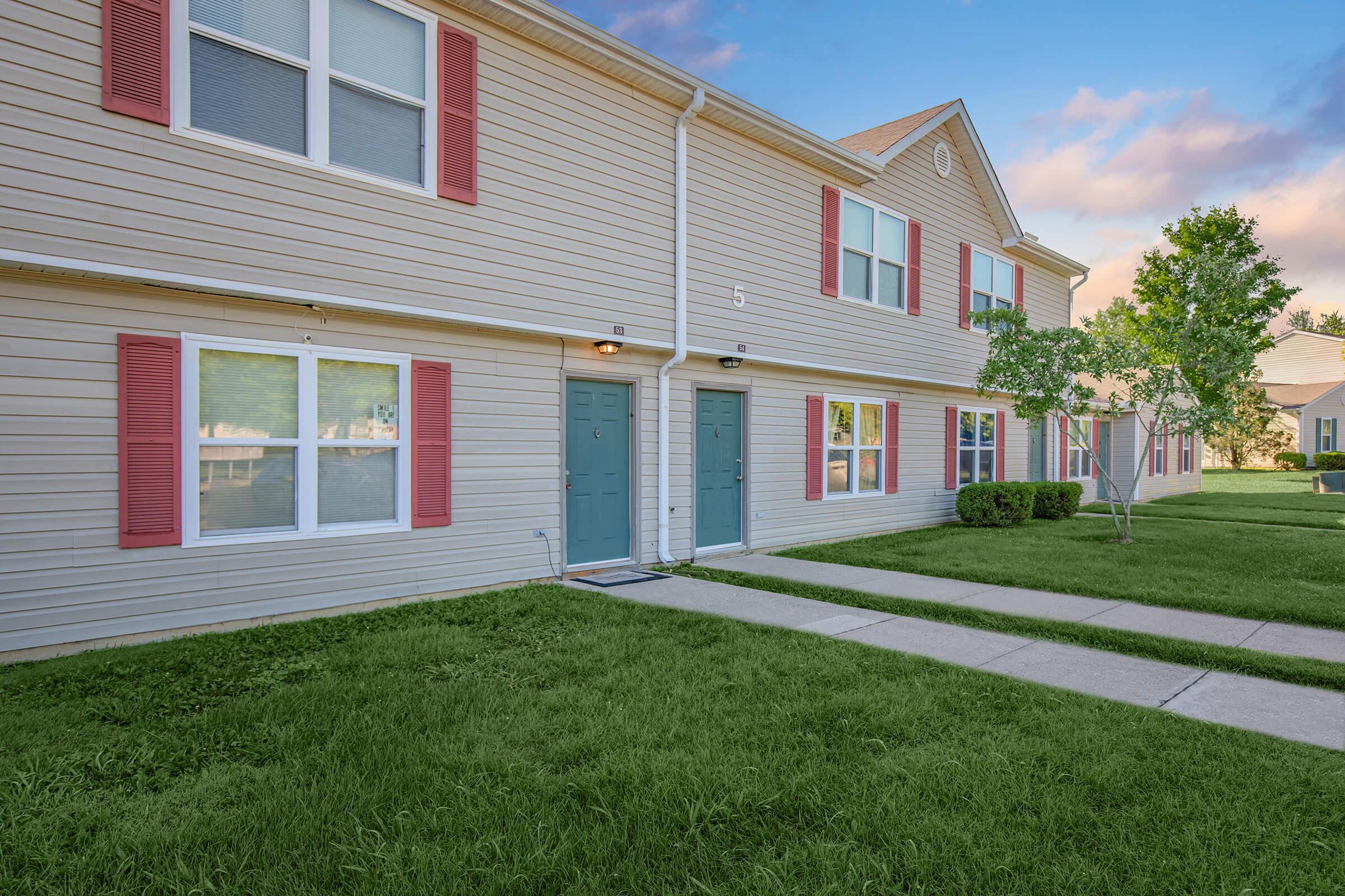 a large lawn in front of a house