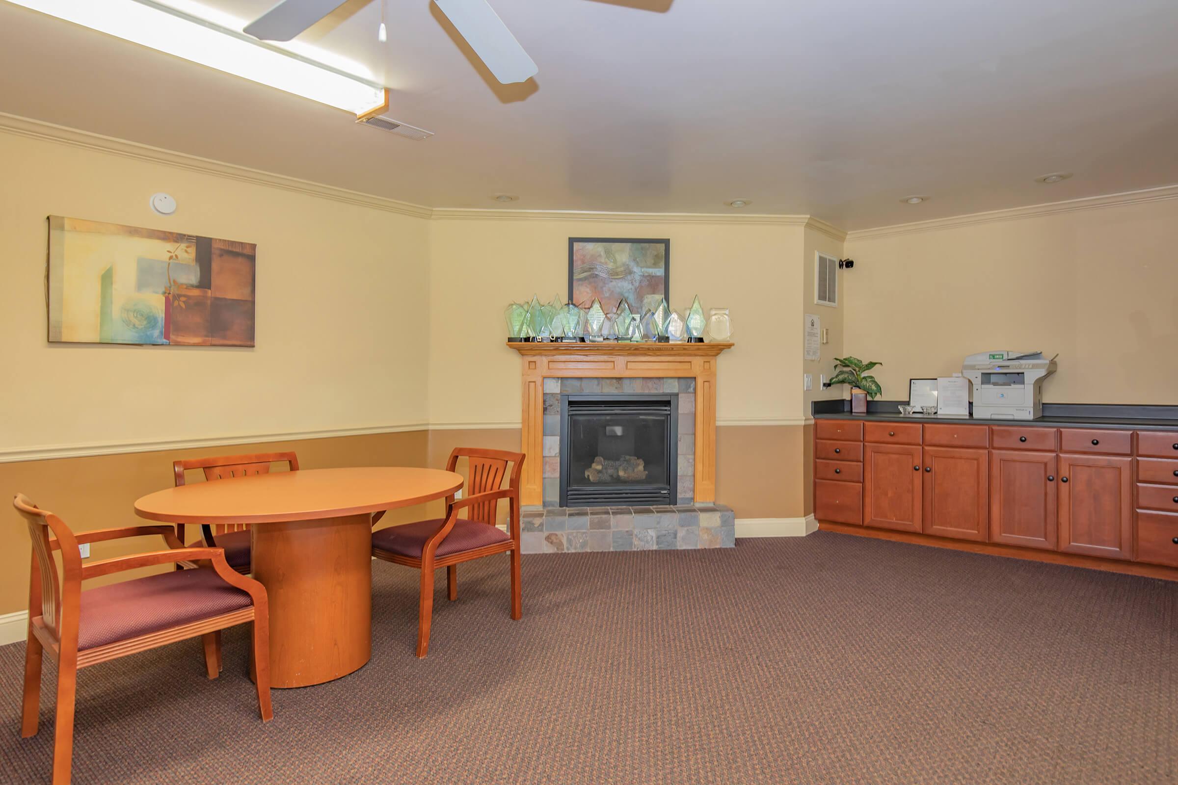 a living room filled with furniture and a tv