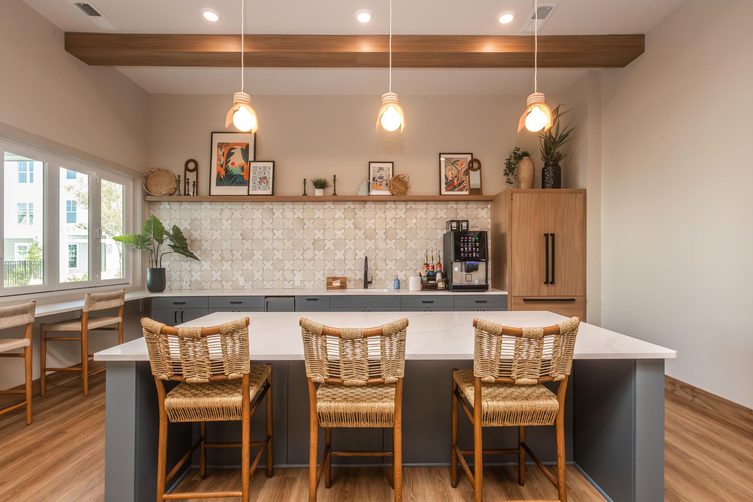 a kitchen with wooden furniture and vase on a table