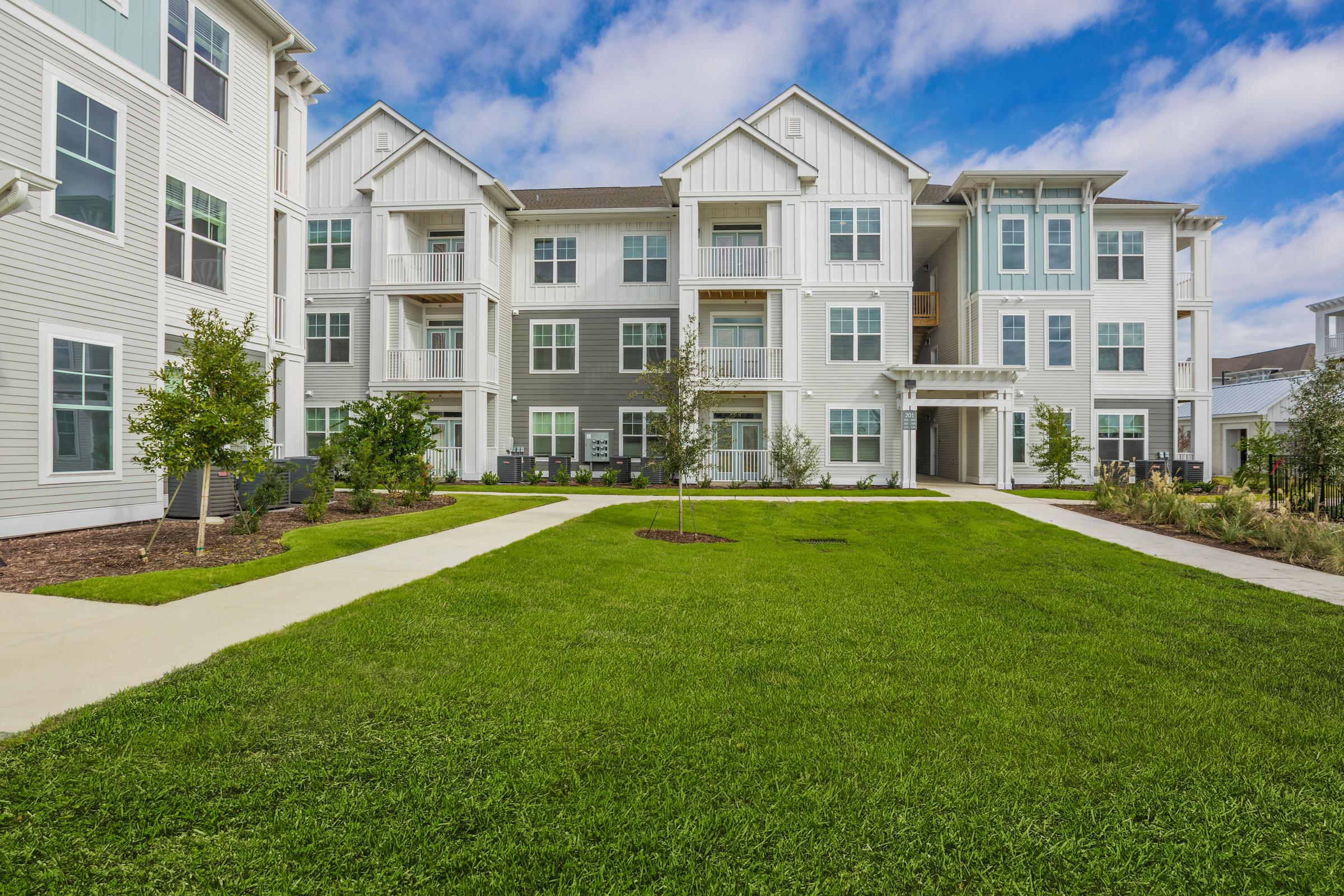 a large lawn in front of a building