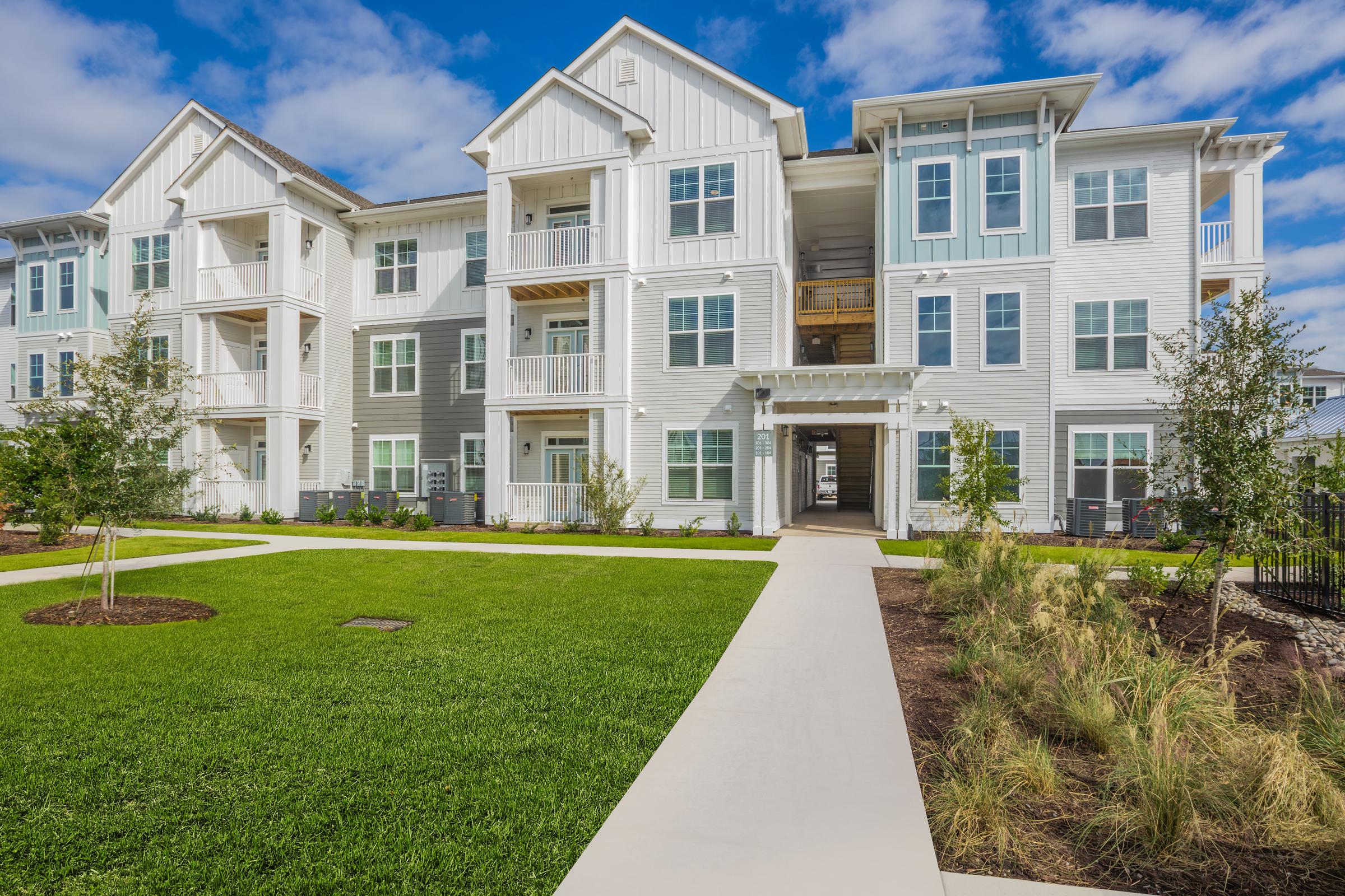 a large lawn in front of a building