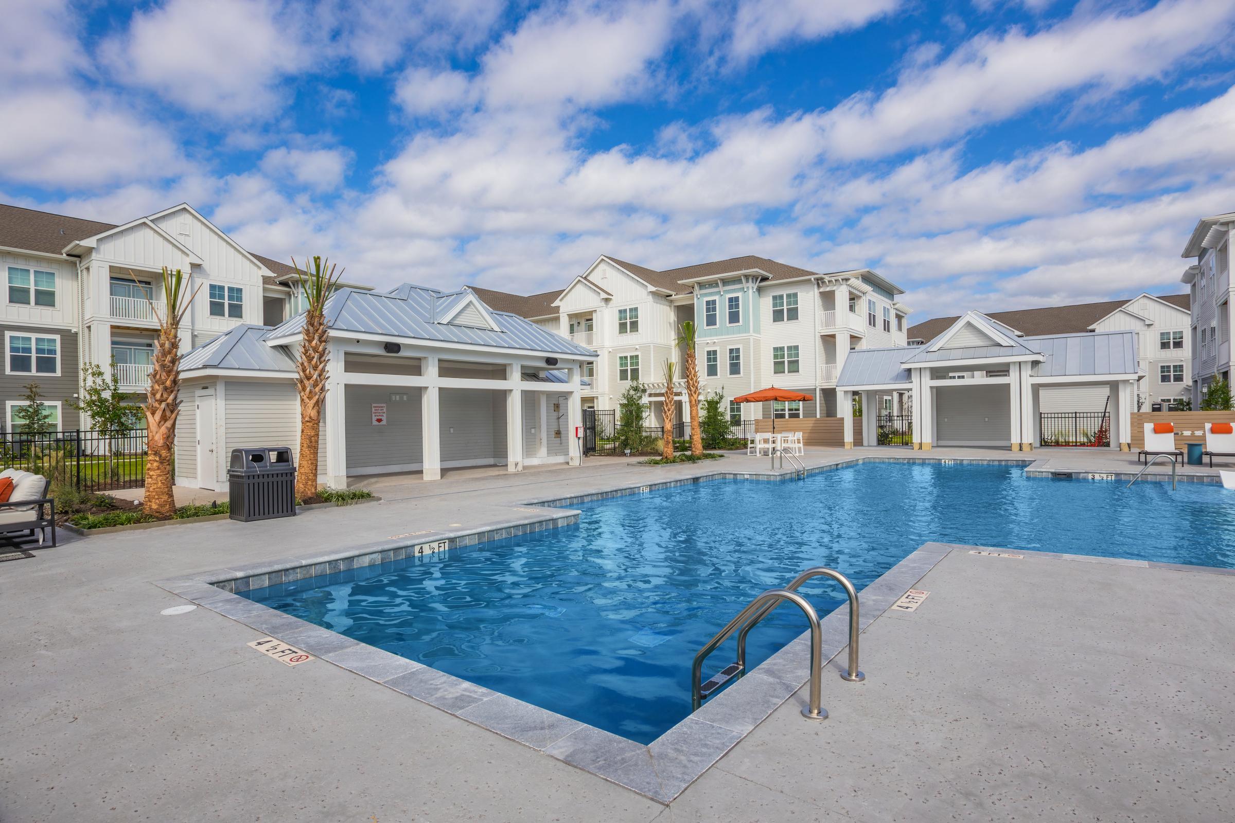 a house with a large pool of water