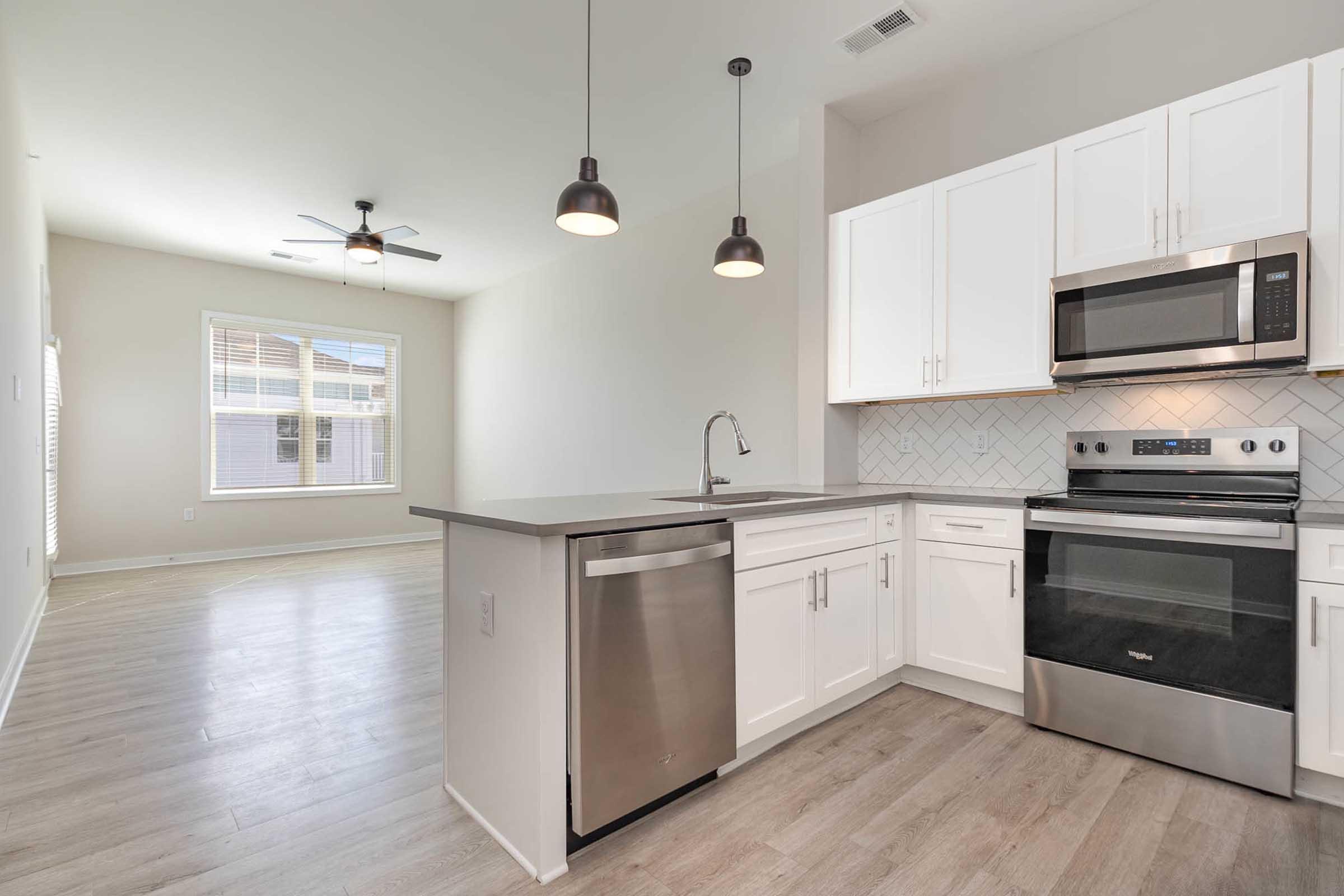 a kitchen with a stove top oven