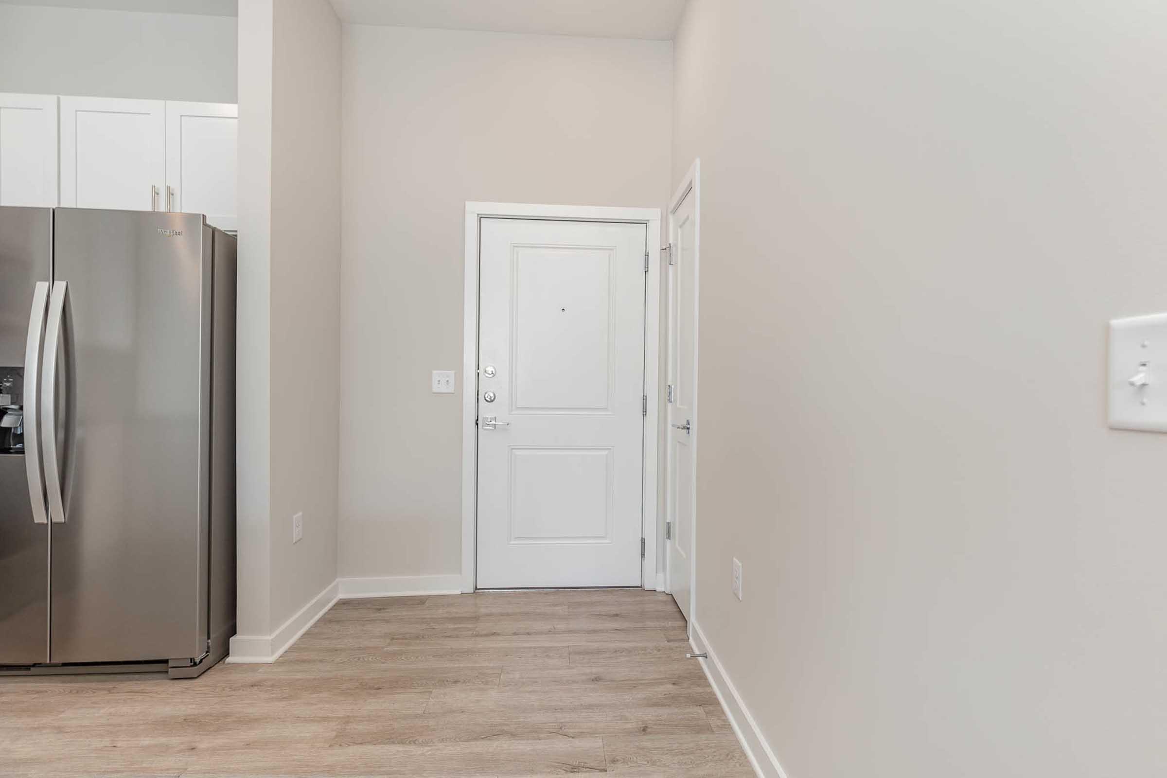 a stainless steel refrigerator in a kitchen