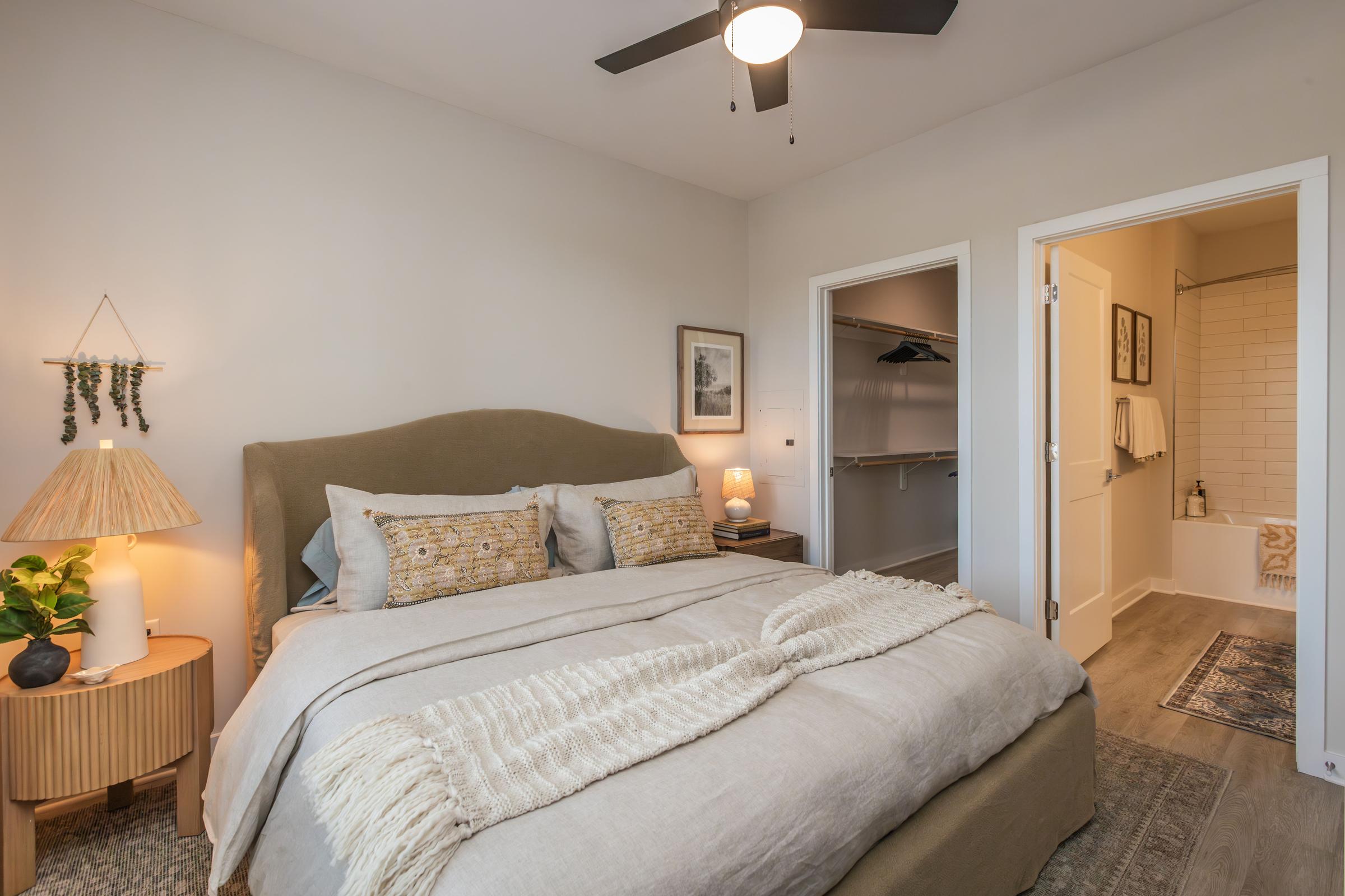 a bedroom with a bed in a hotel room