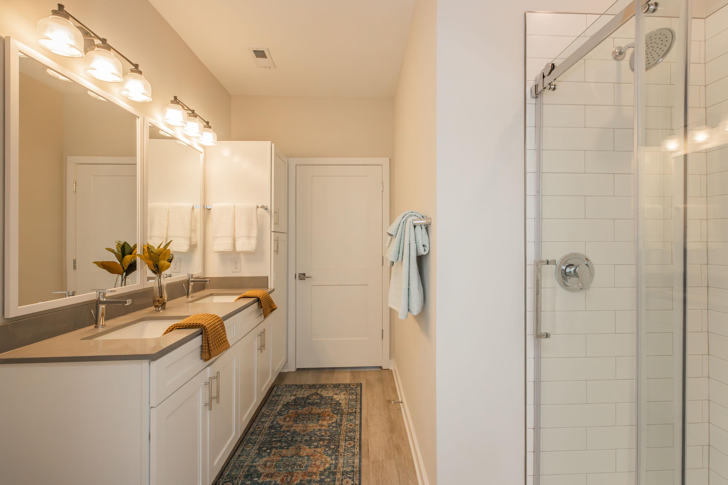 a kitchen with a sink and a mirror