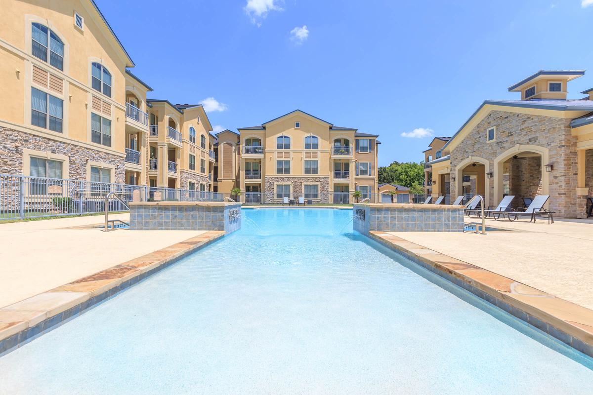 a pool next to a building