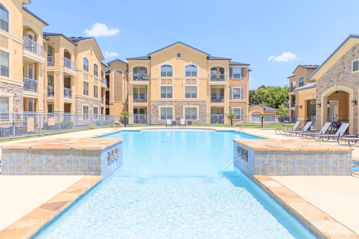 a pool next to a building