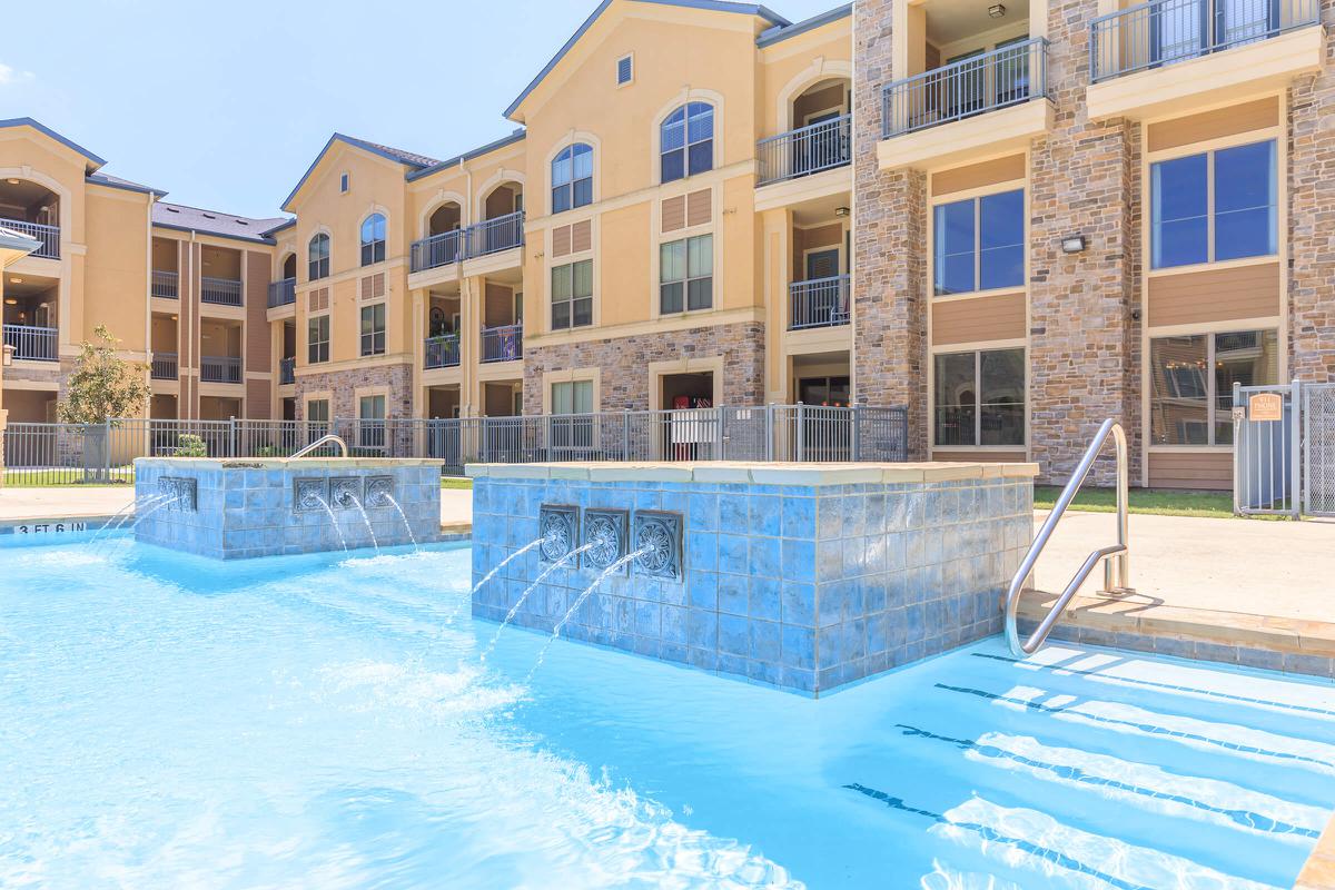 a pool next to a building