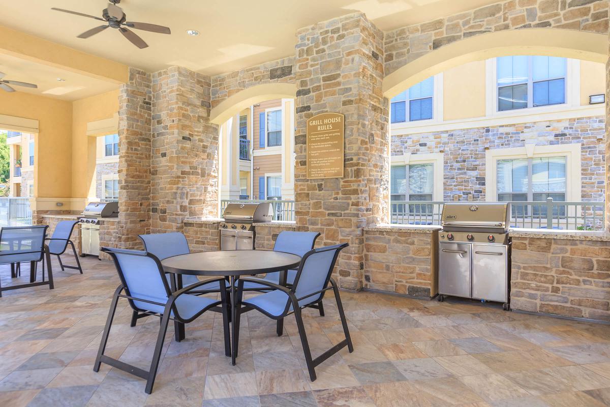 a dining room table in front of a window