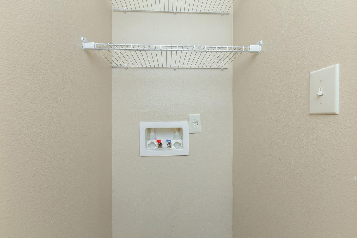a white refrigerator freezer sitting in a room