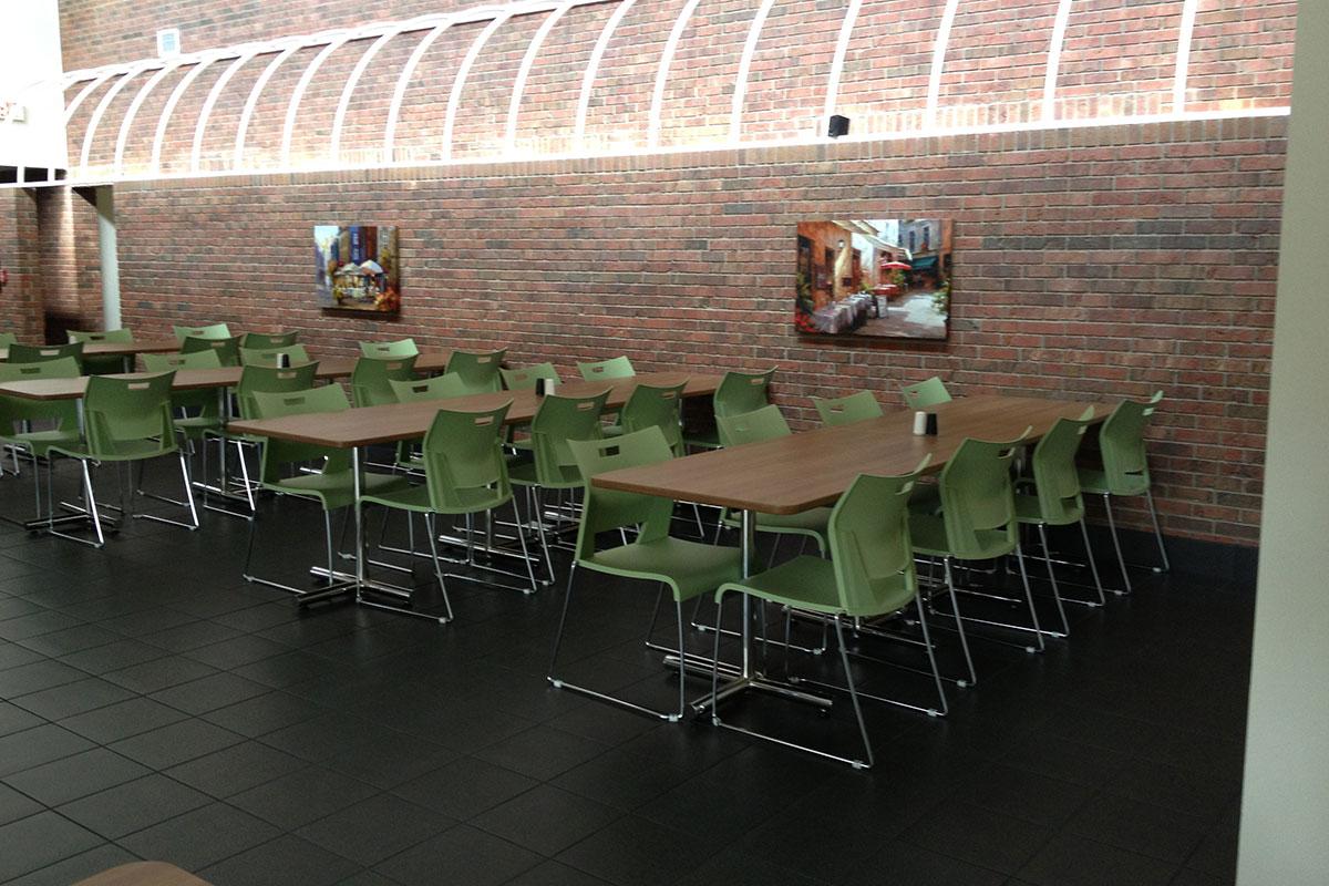 a chair sitting in front of a table