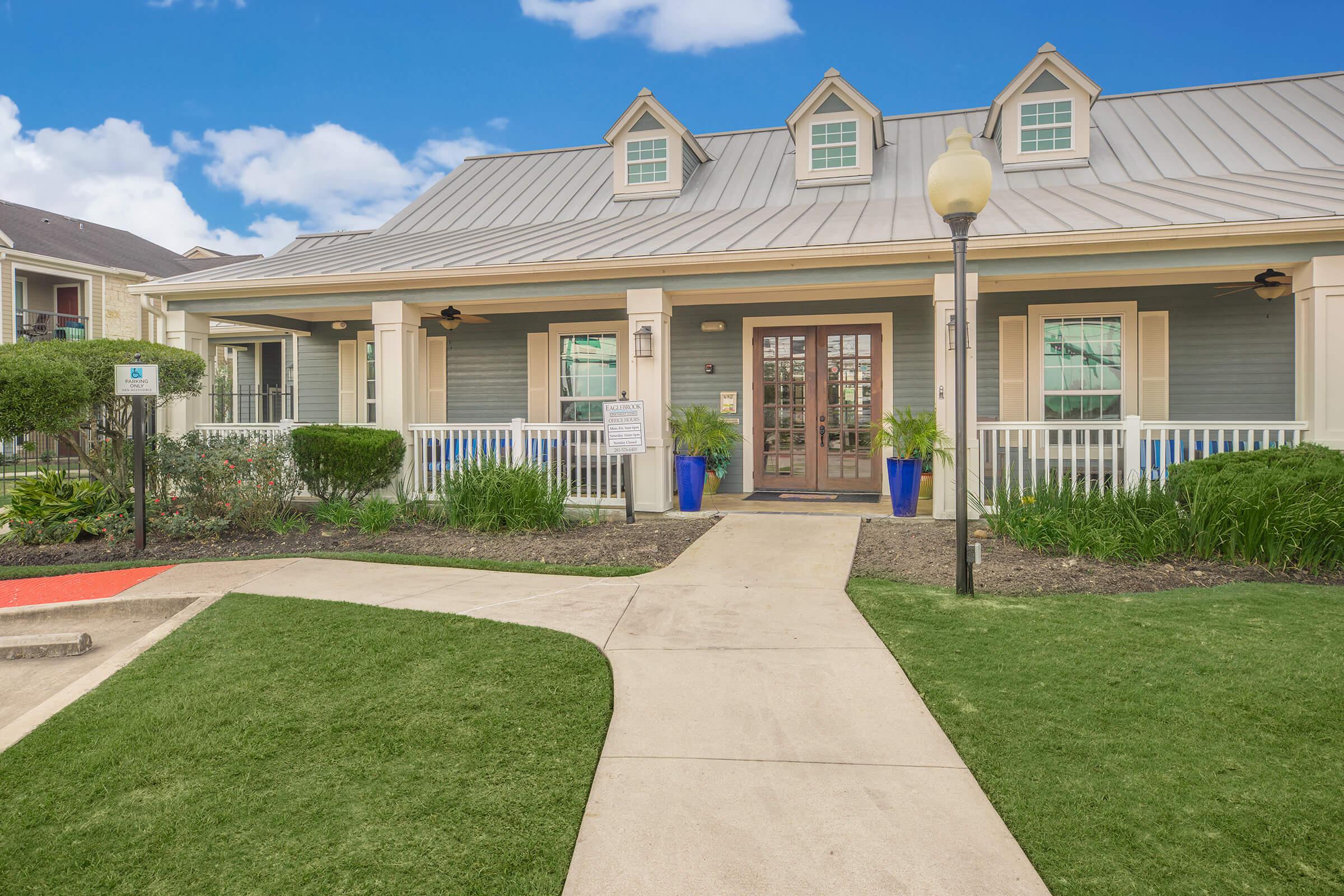 a large lawn in front of a house