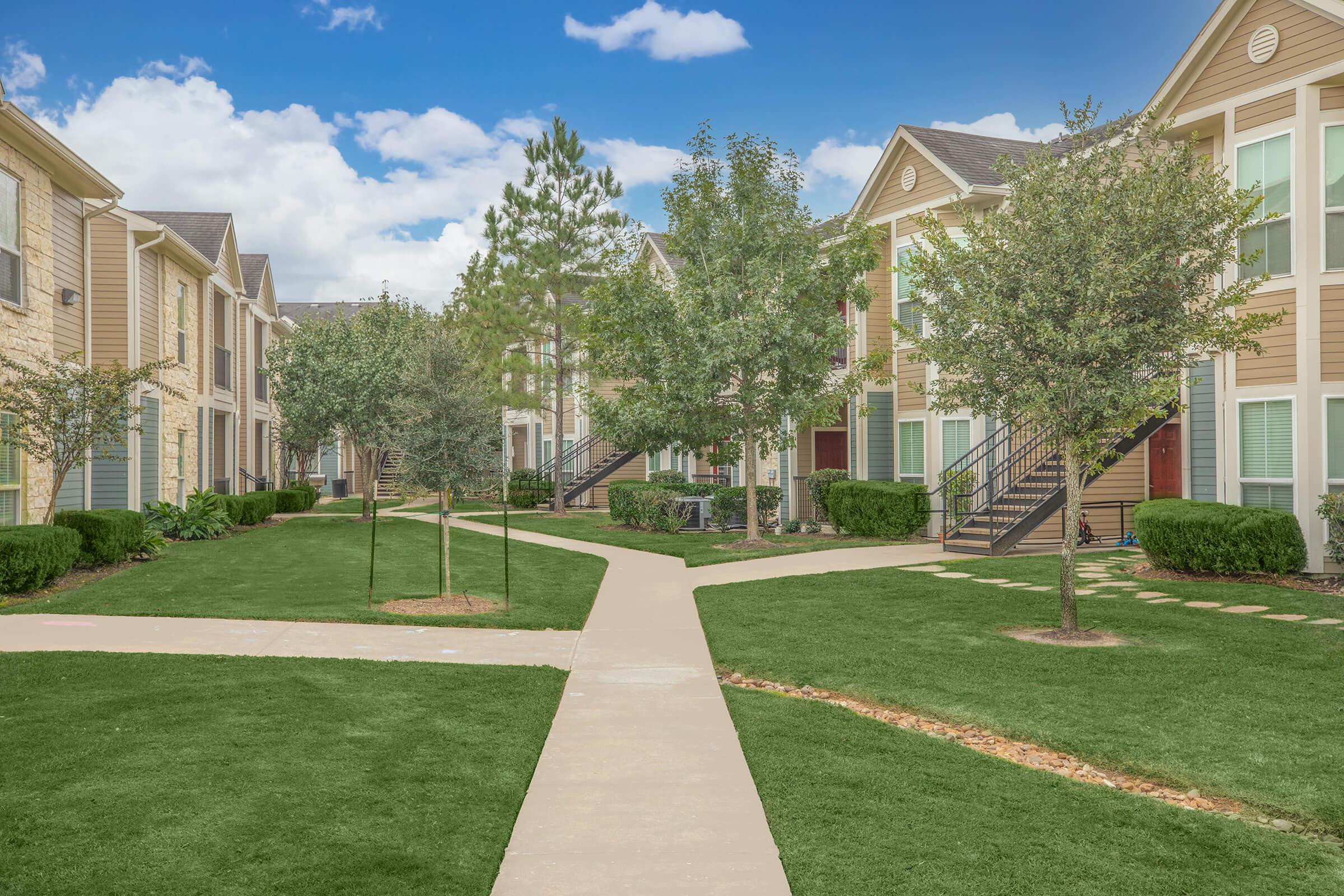 a large lawn in front of a house