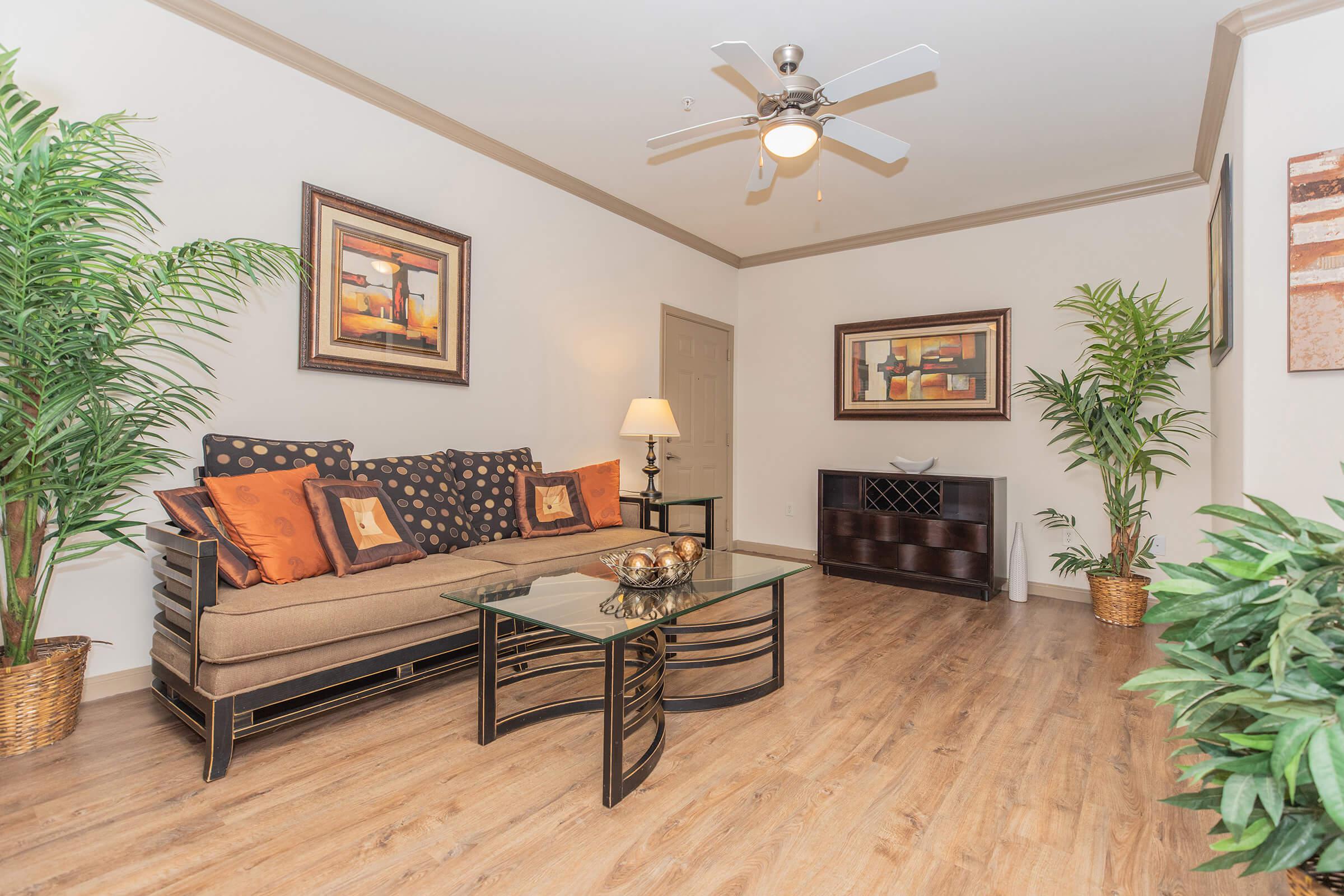 a living room filled with furniture and a fireplace