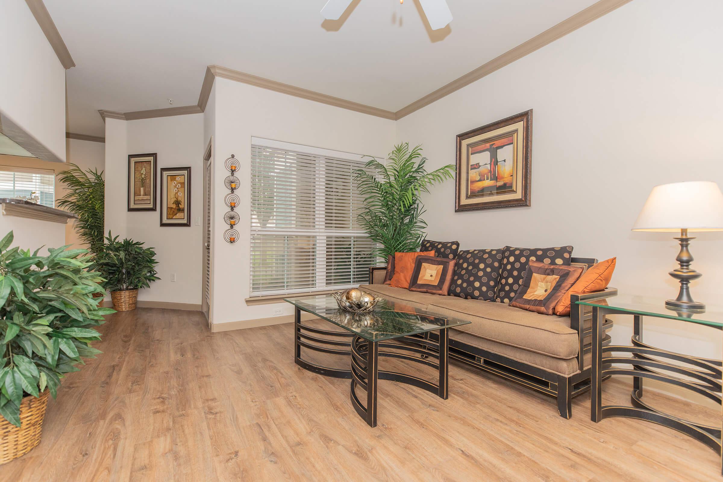 a living room filled with furniture and a fireplace