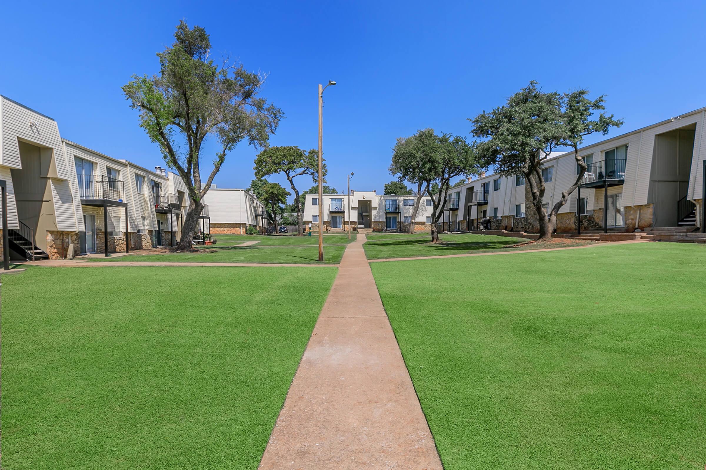 a large lawn in front of a building