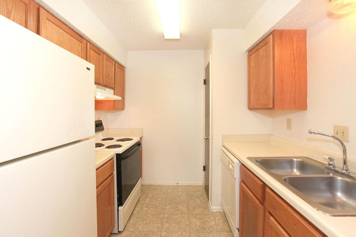 a stainless steel refrigerator in a kitchen