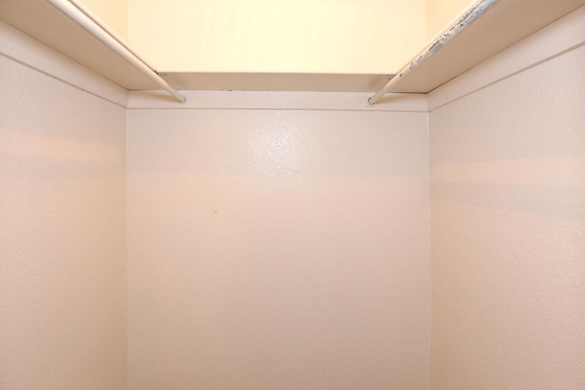 a white refrigerator freezer sitting in a room