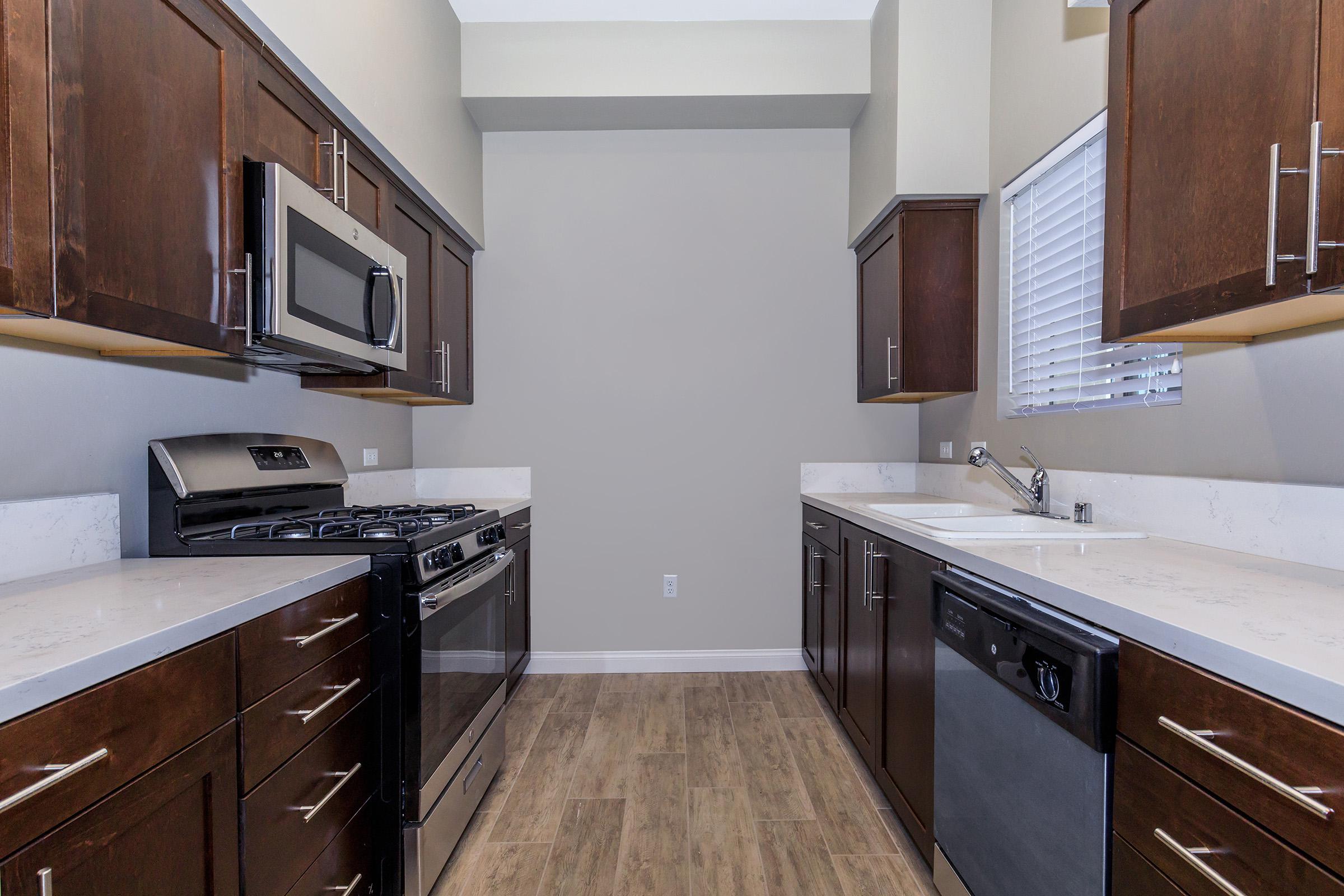 Kitchen with wooden cabinets