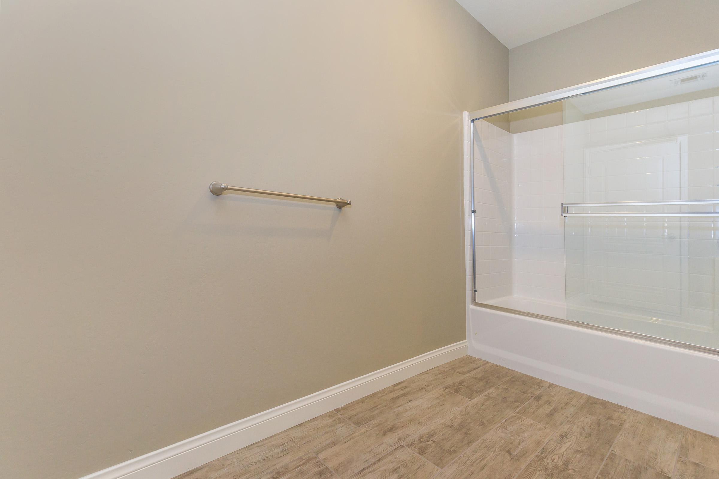 Bathroom with sliding glass shower door