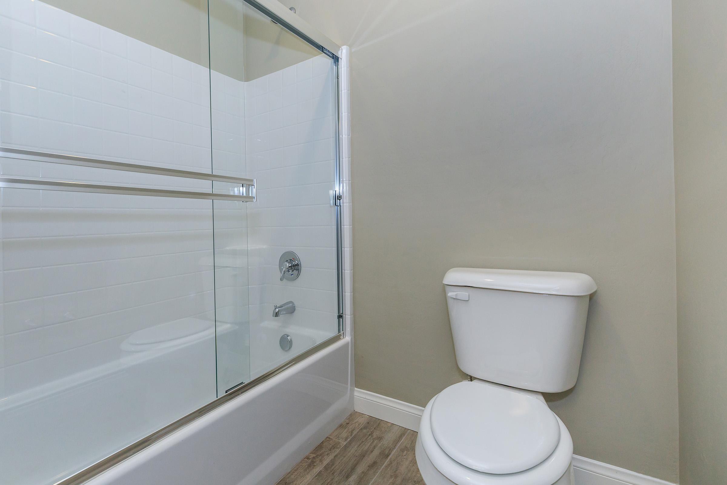 Vacant bathroom with sliding glass shower doors