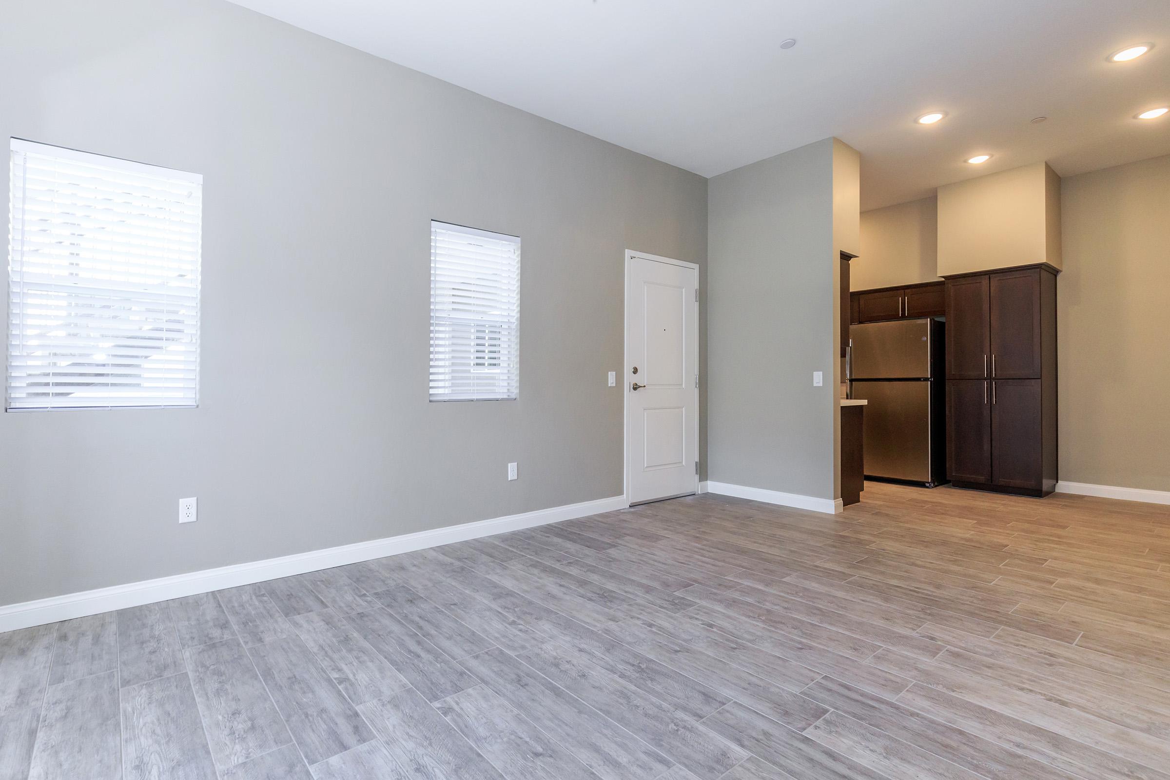 Living room and dining room with wooden floors