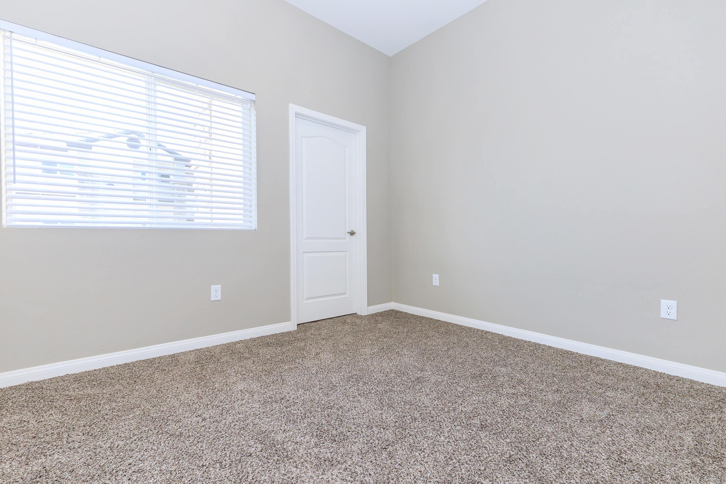 Carpeted vacant room