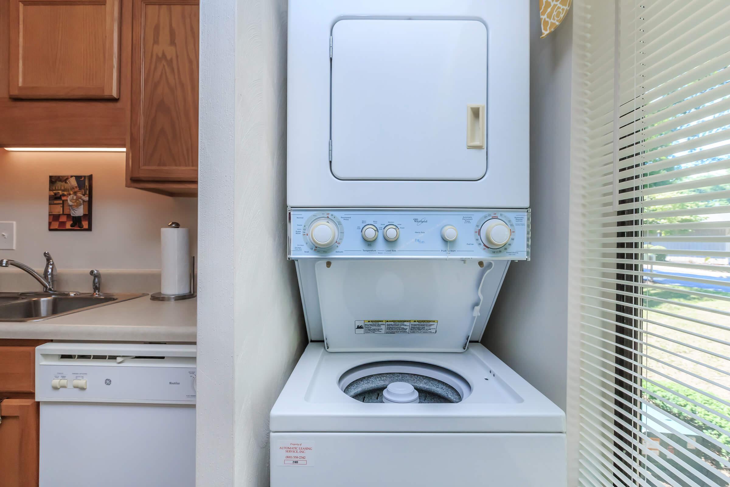 a kitchen with a sink and a microwave