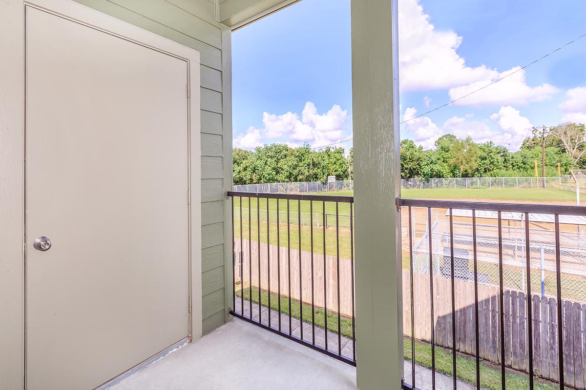 Private balcony with views of blue sky with clouds 