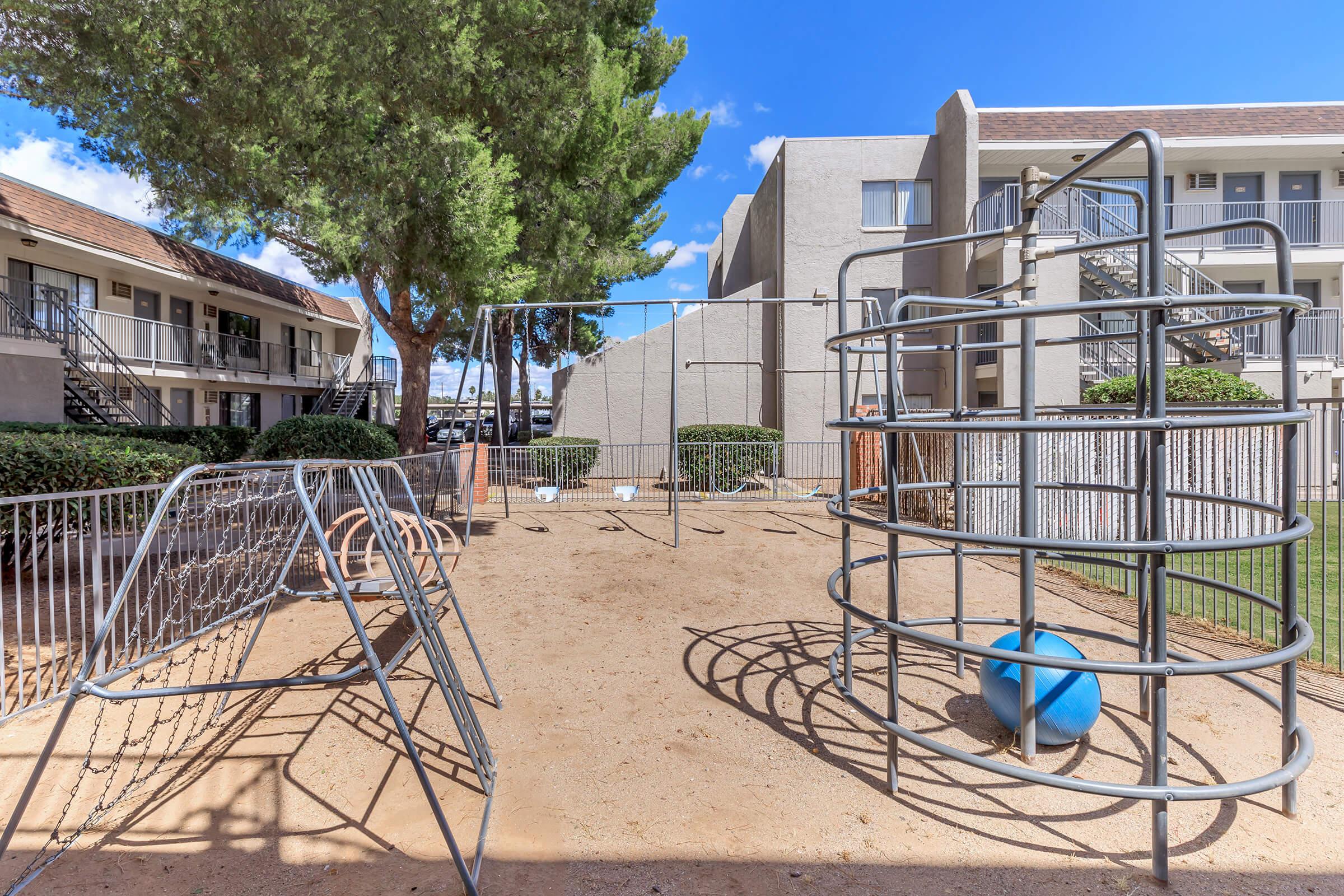 a building with a metal fence