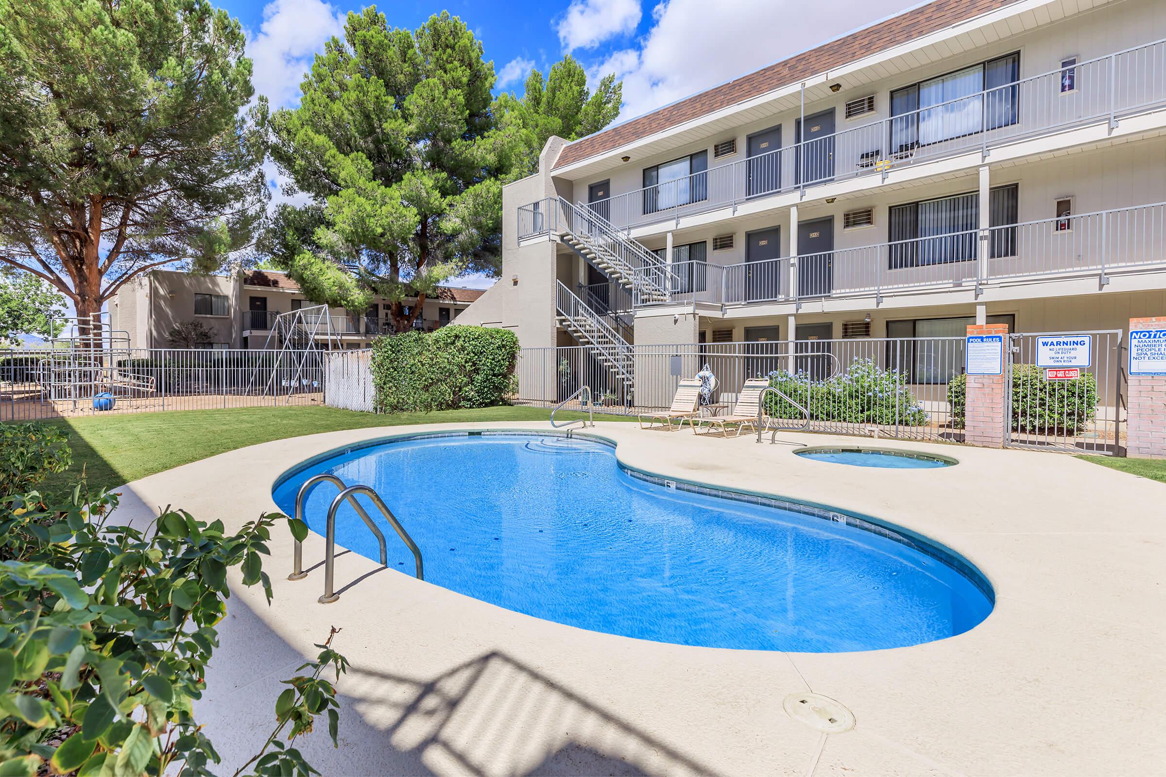 a pool in front of a building