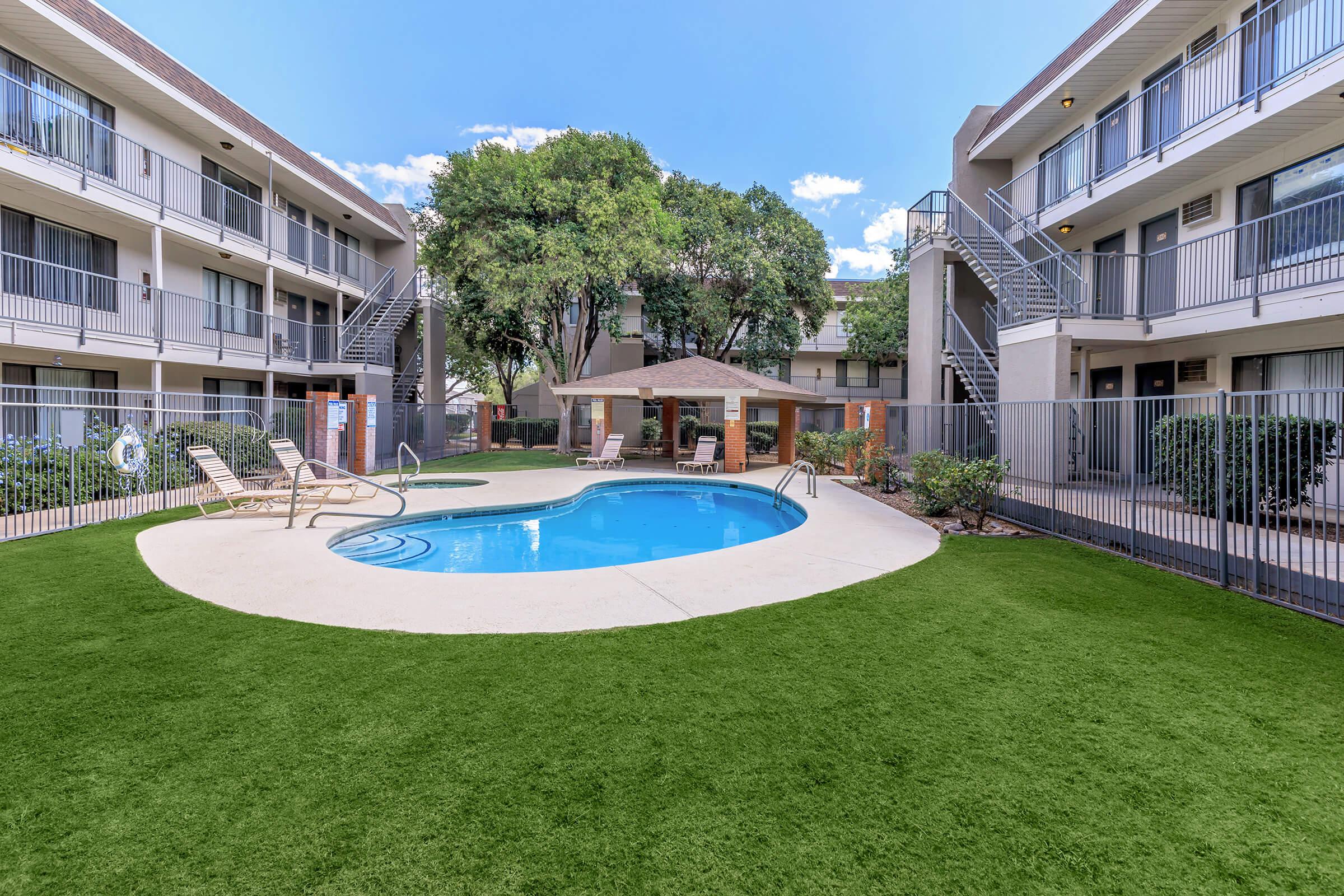 a large lawn in front of a building