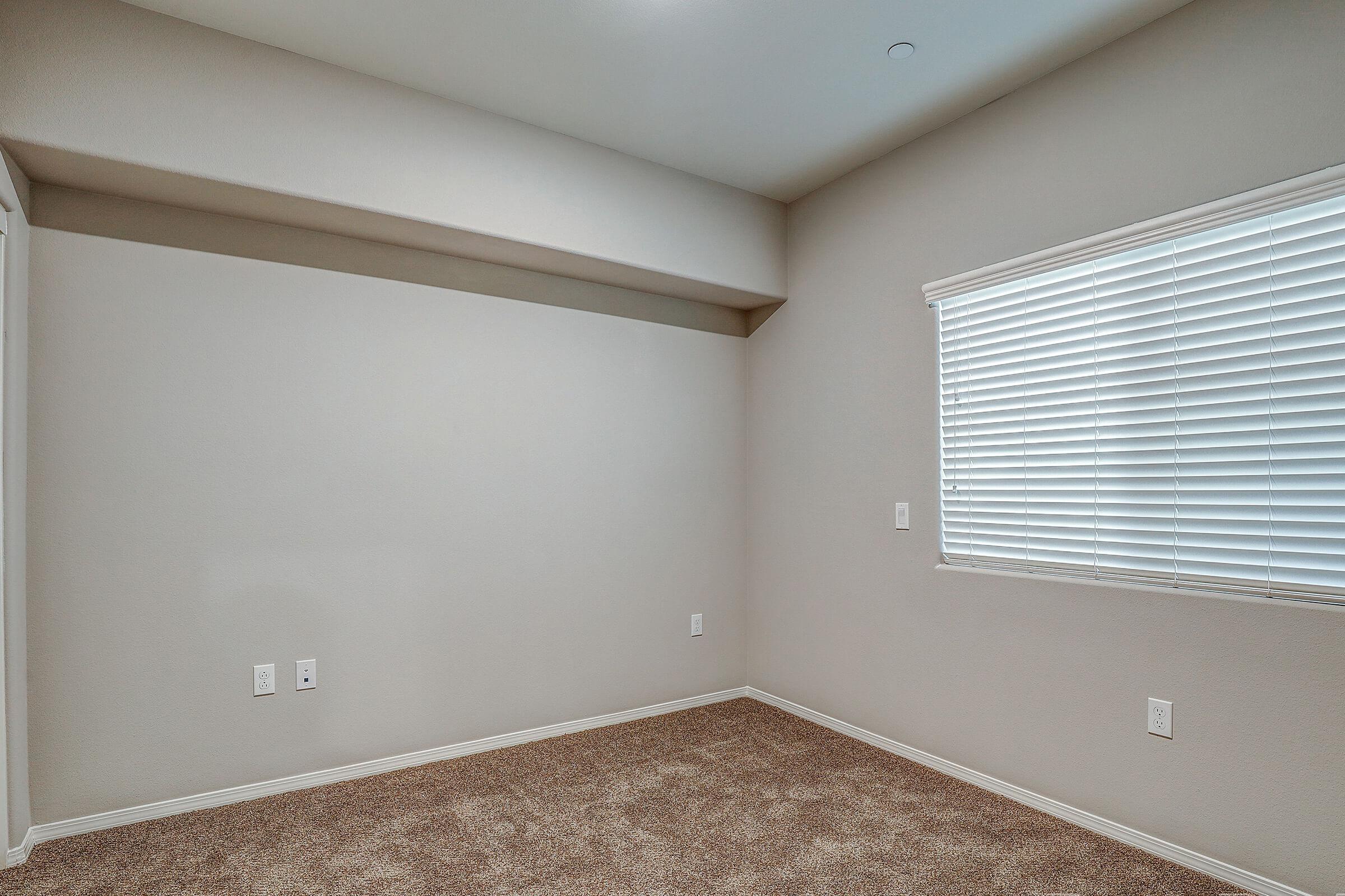 a room with a sink and a window