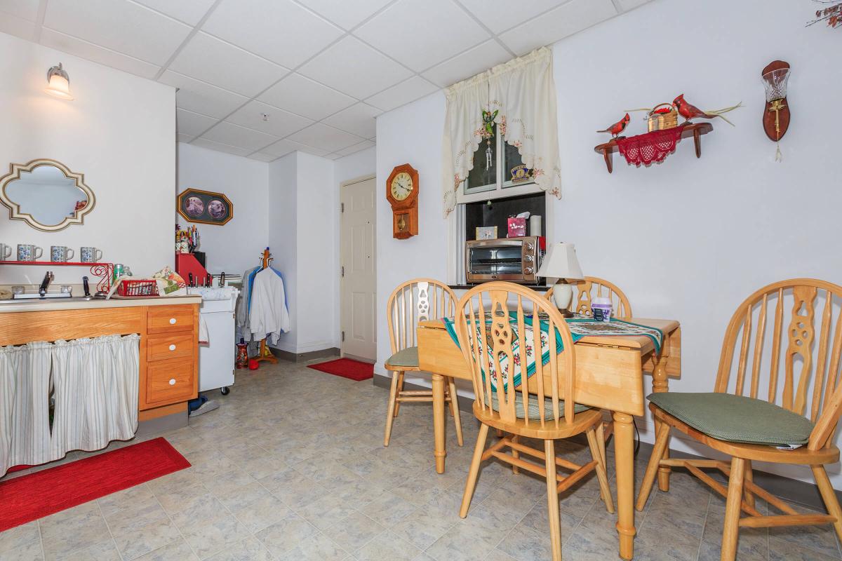 a kitchen with a dining room table