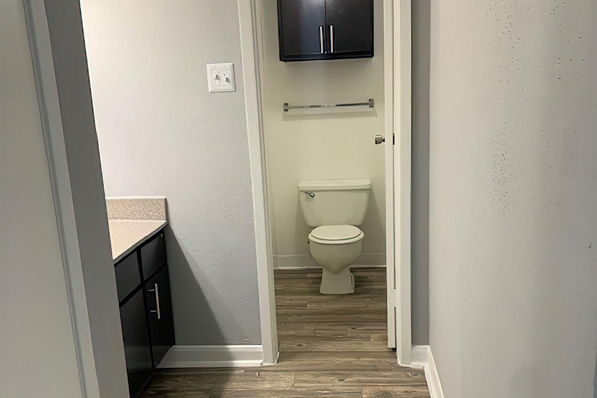 a restroom with a sink and a mirror