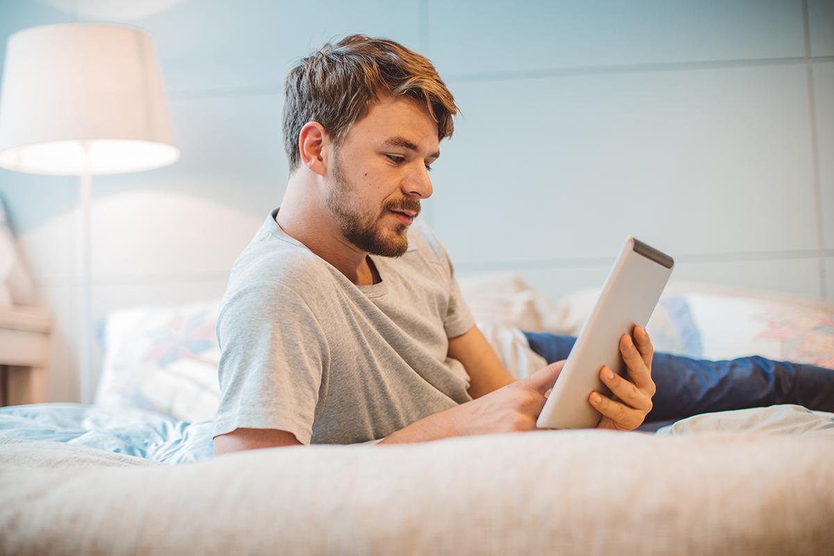 man reading on bed.jpg