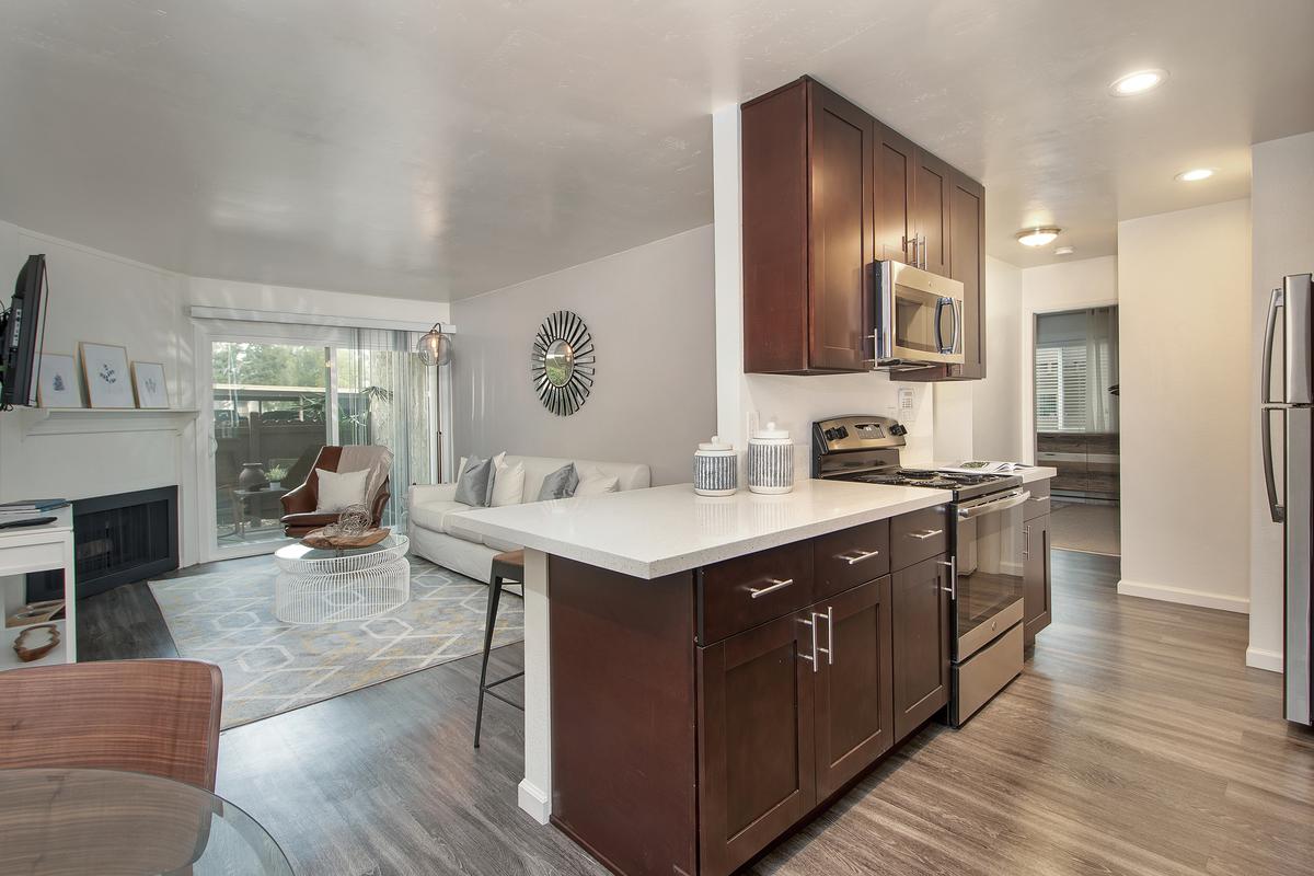 a kitchen with a wood floor