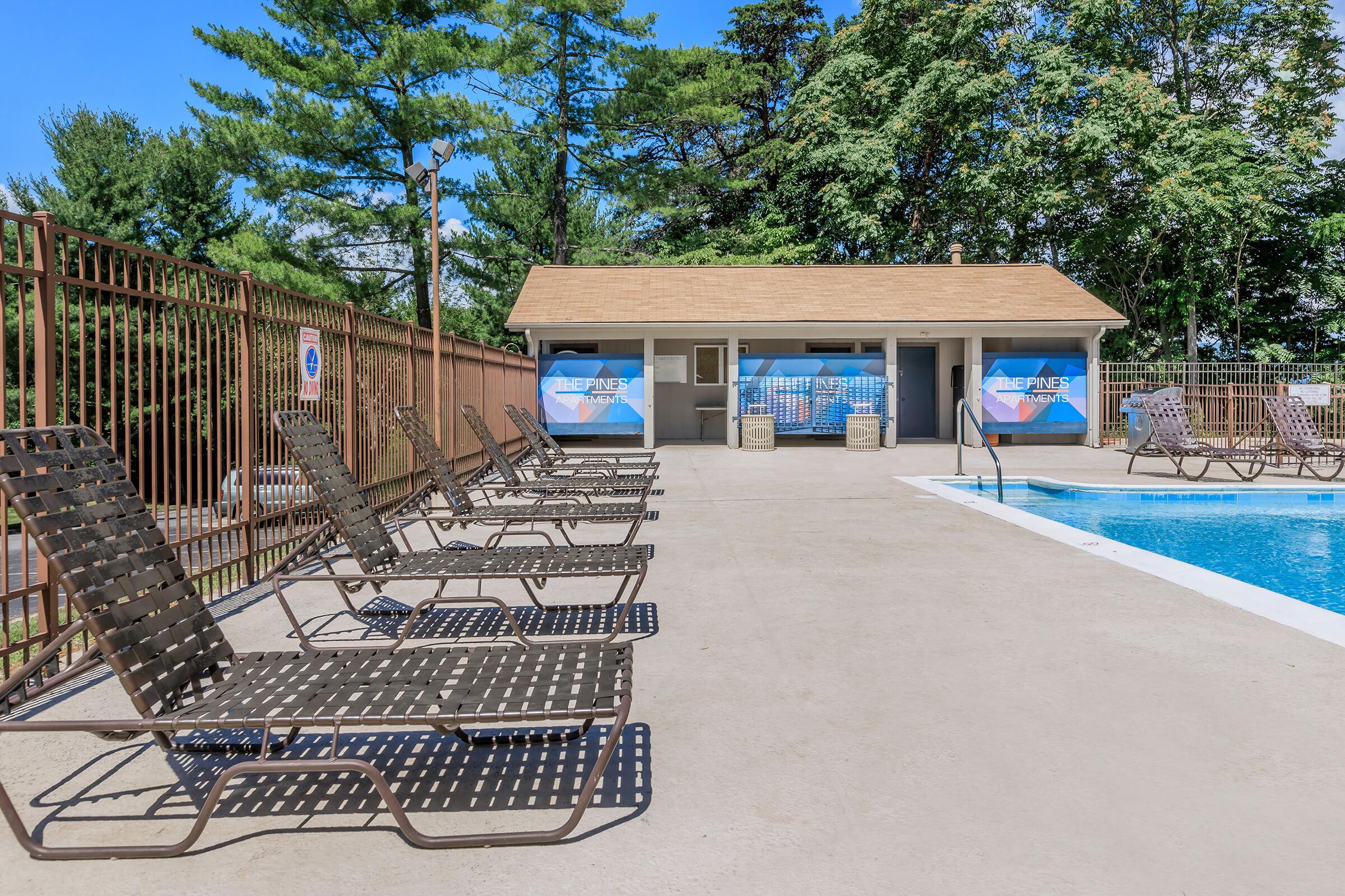 a pool next to a fence