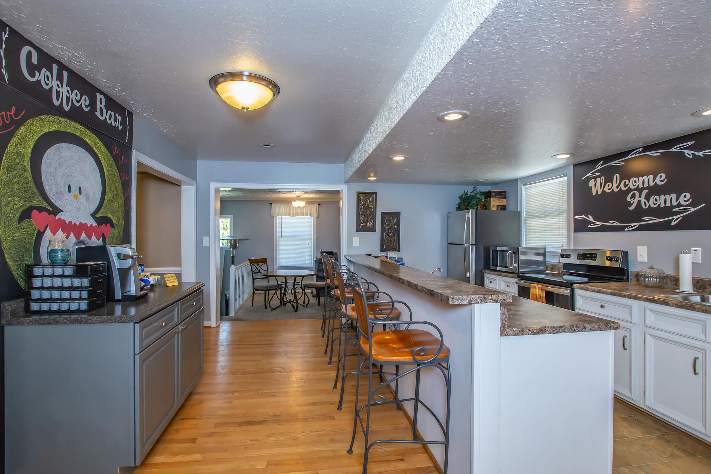 a kitchen with a dining room table