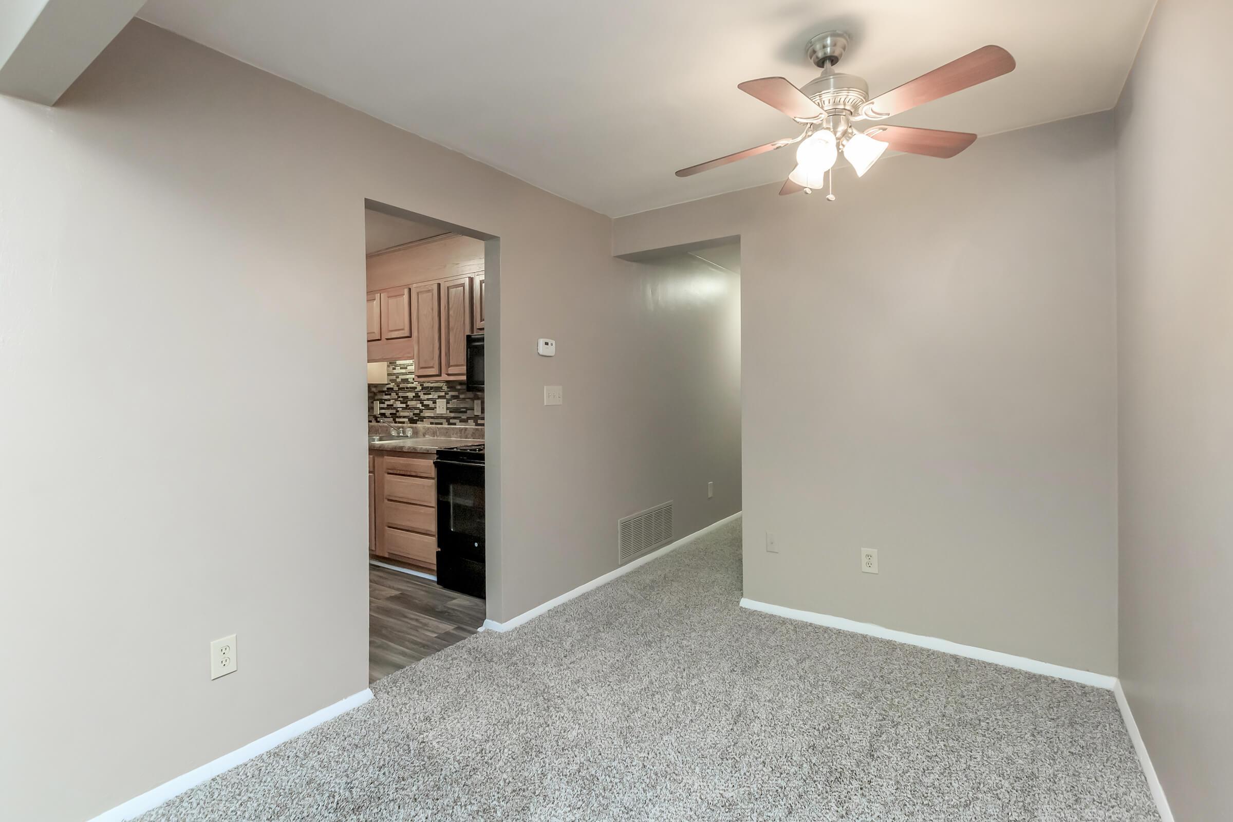 a bedroom with a large mirror