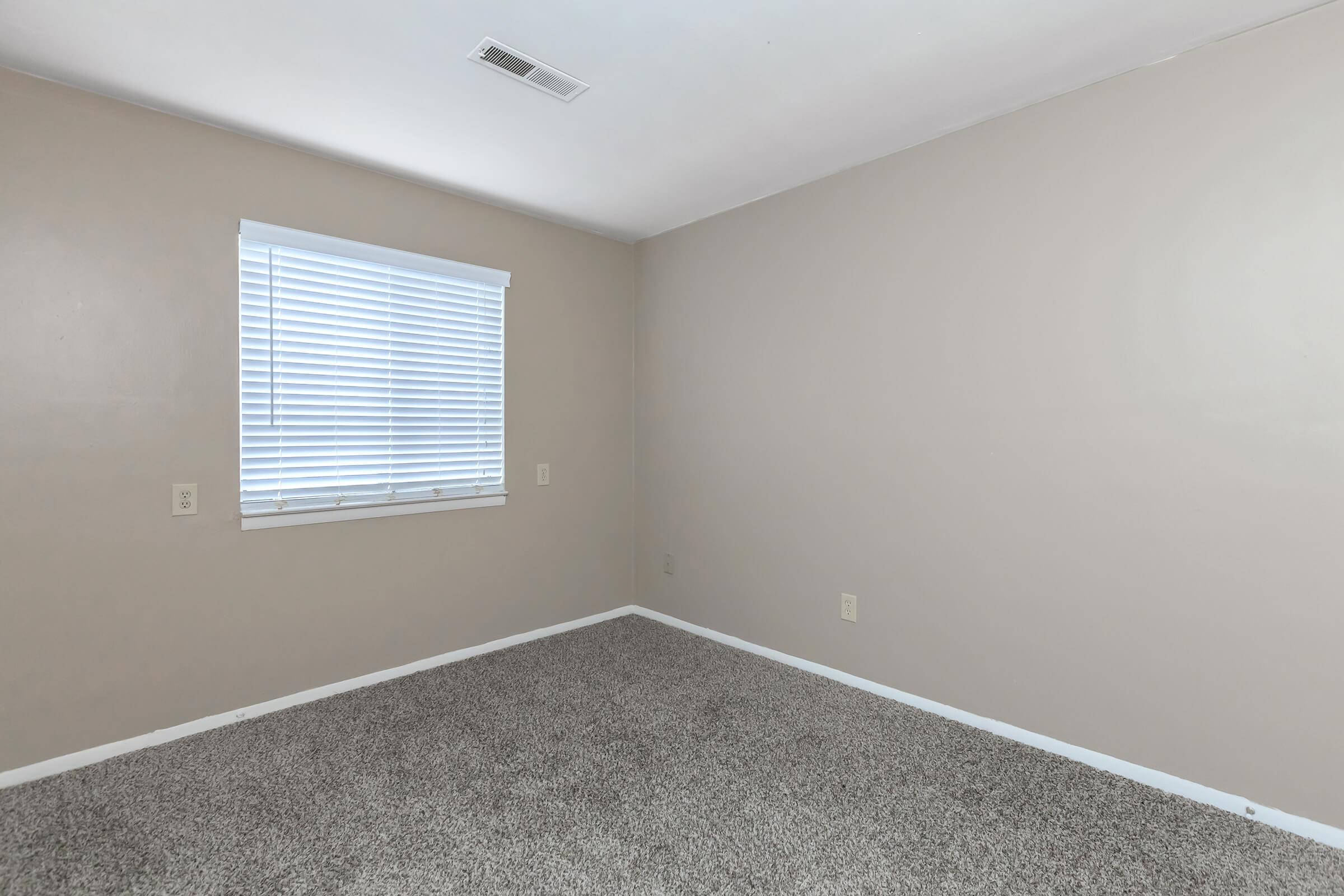 a room with a sink and a window