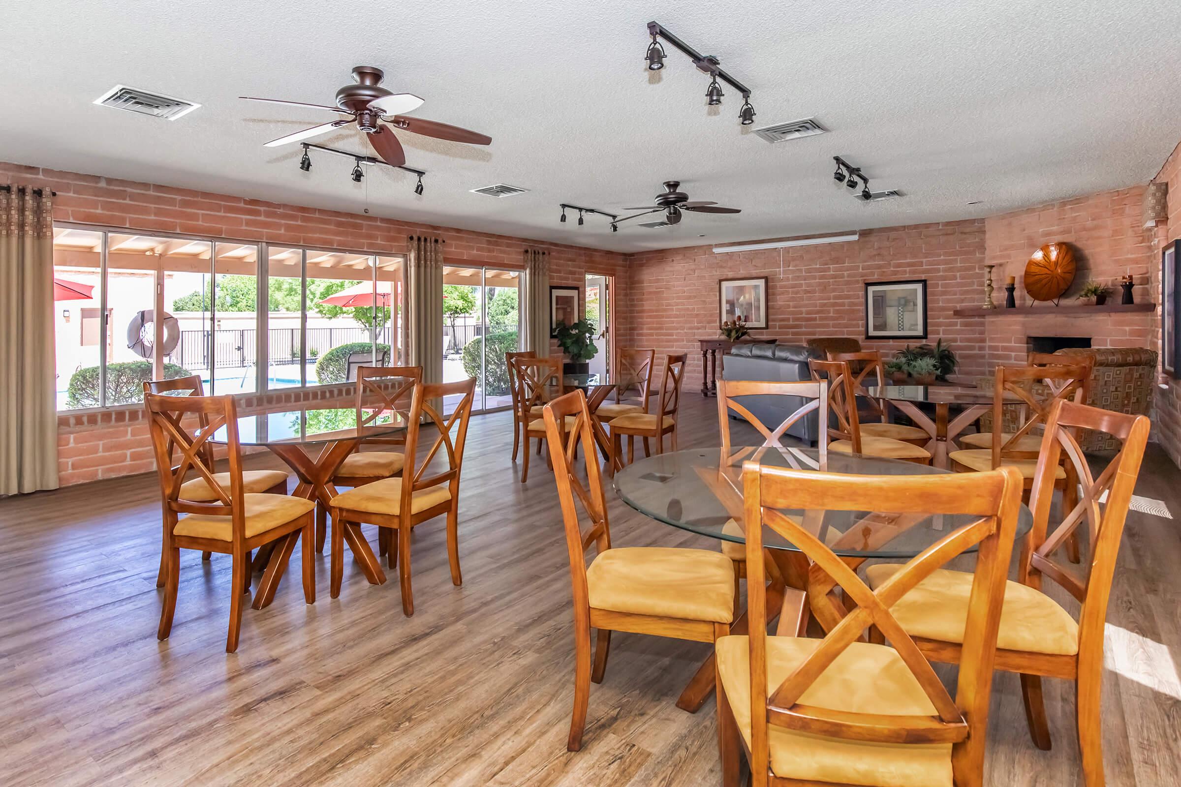 a dining room table in front of a wooden floor